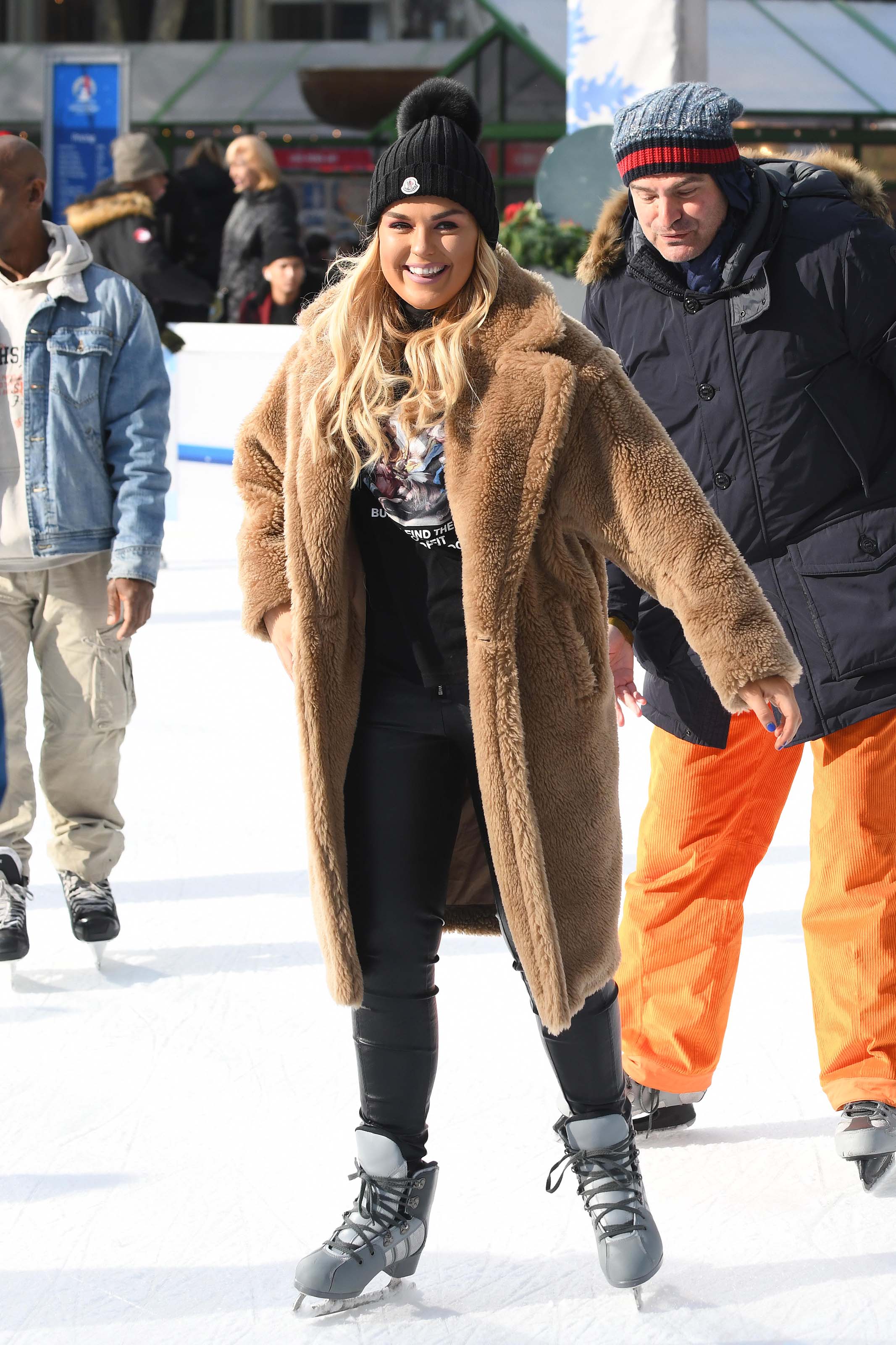 Tallia Storm ice skating in Bryant Park