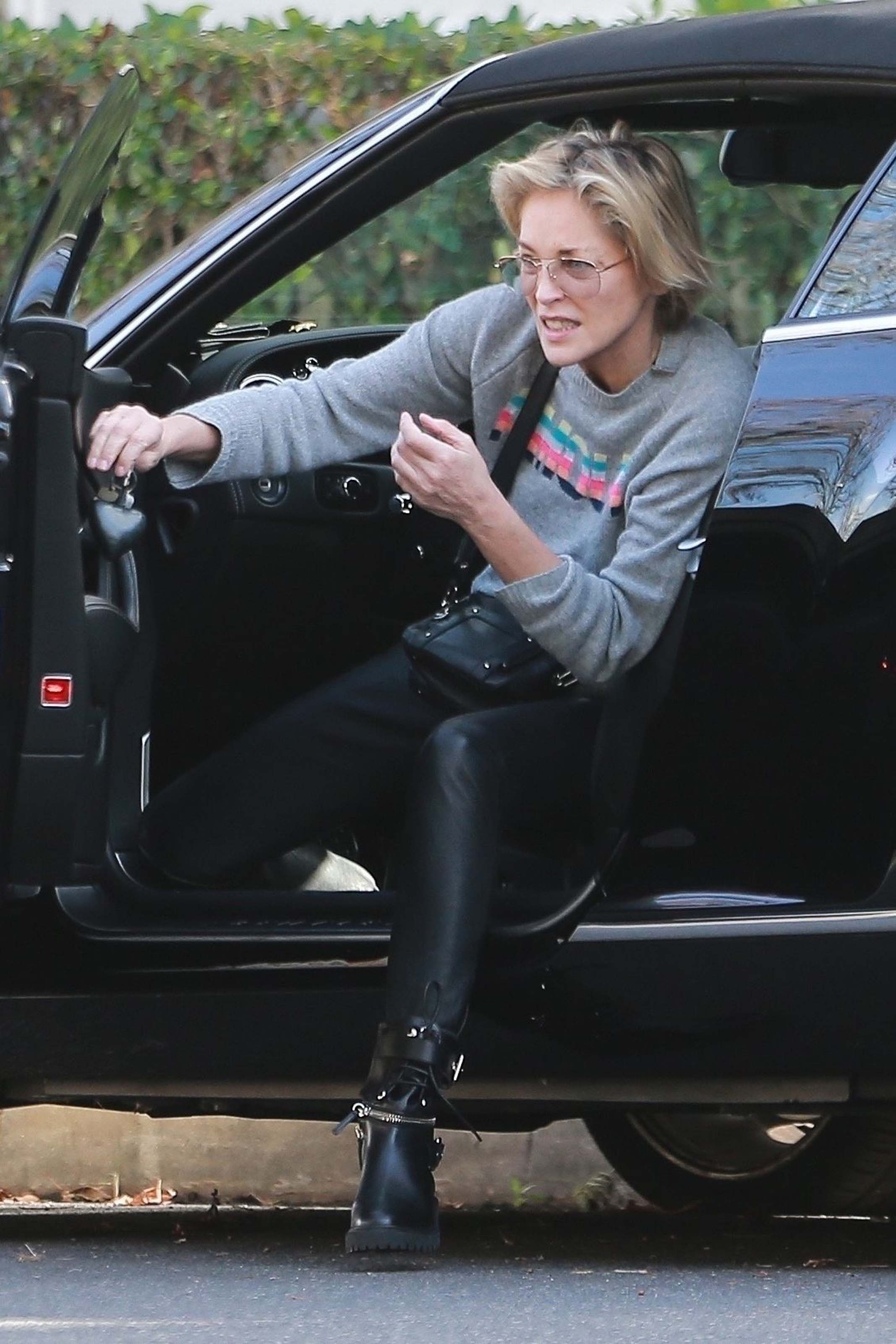 Sharon Stone heads to a friend’s house