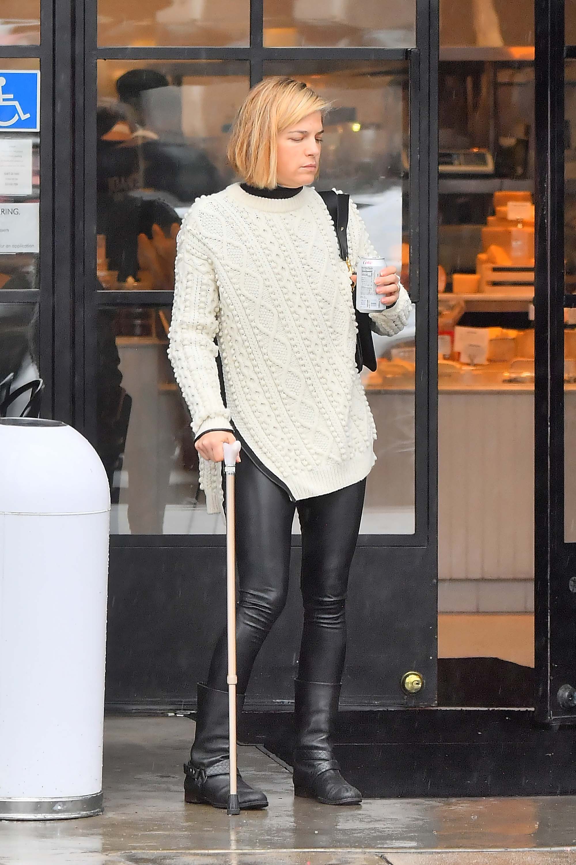 Selma Blair uses a cane leaving a restaurant