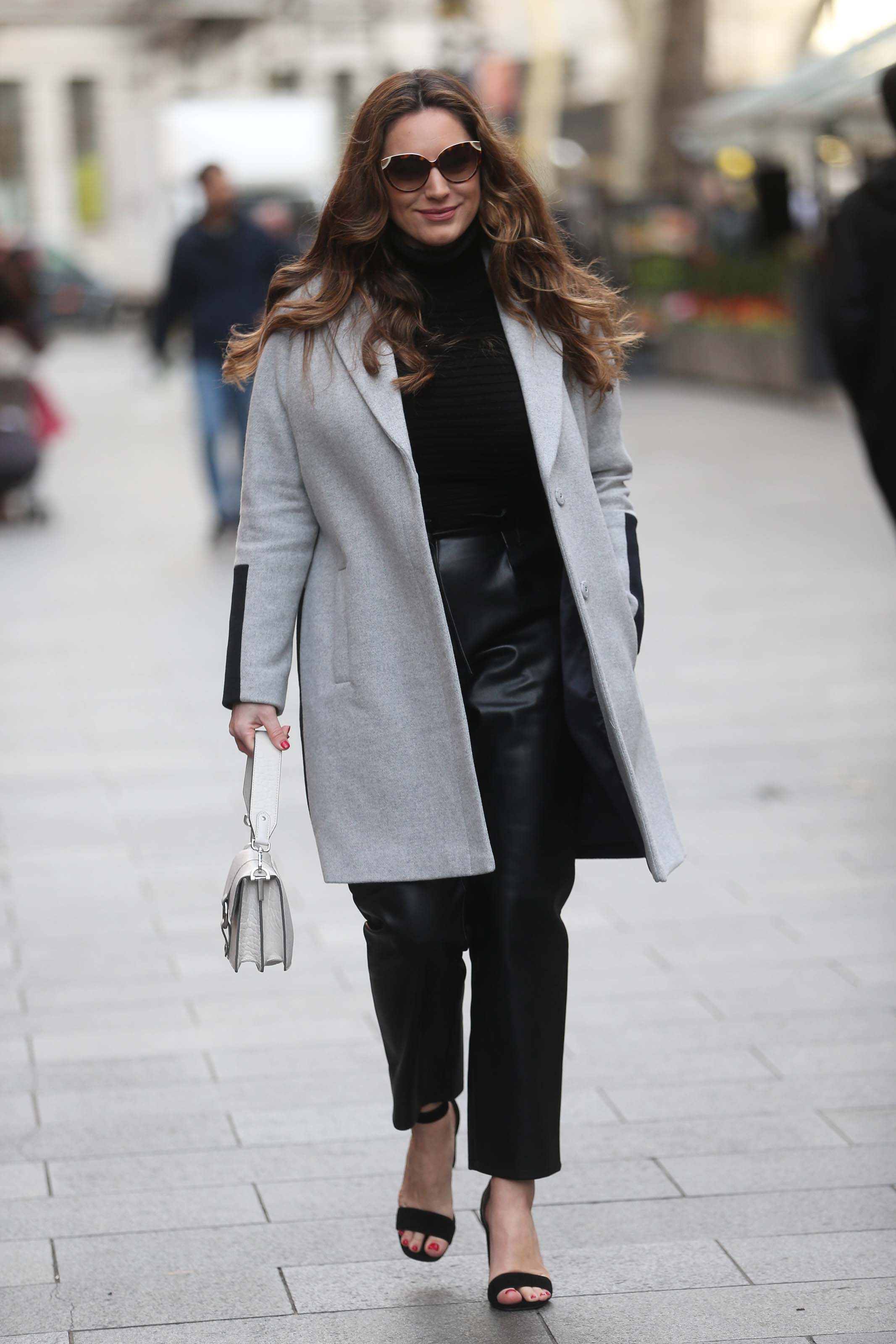 Kelly Brook arrives for work on Heart Radio