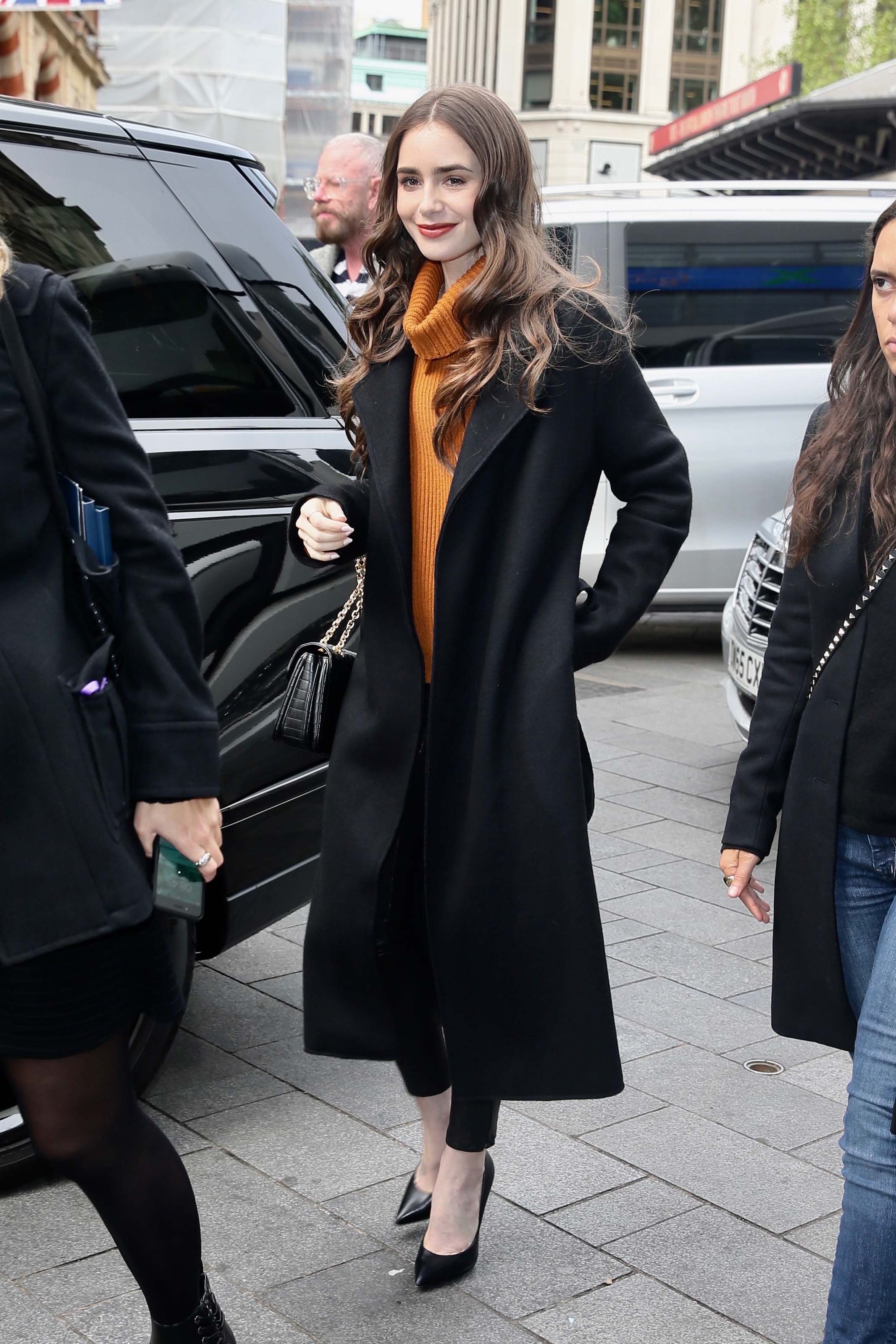 Lily Collins seen arriving at Global studios for radio interviews in London, 04/29/2019