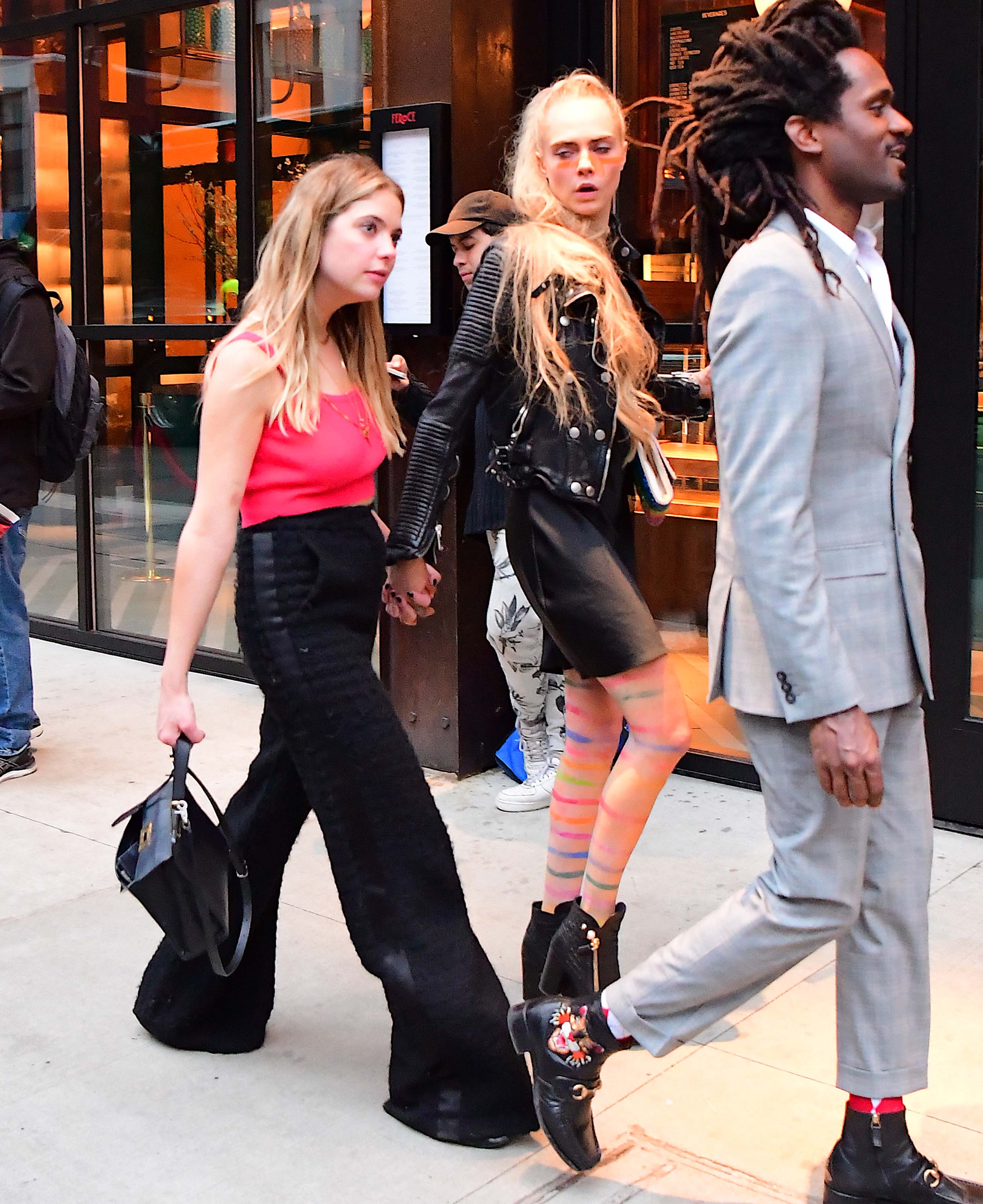 Ashley Benson & Cara Delevingne hold hands leaving Met Gala After Party