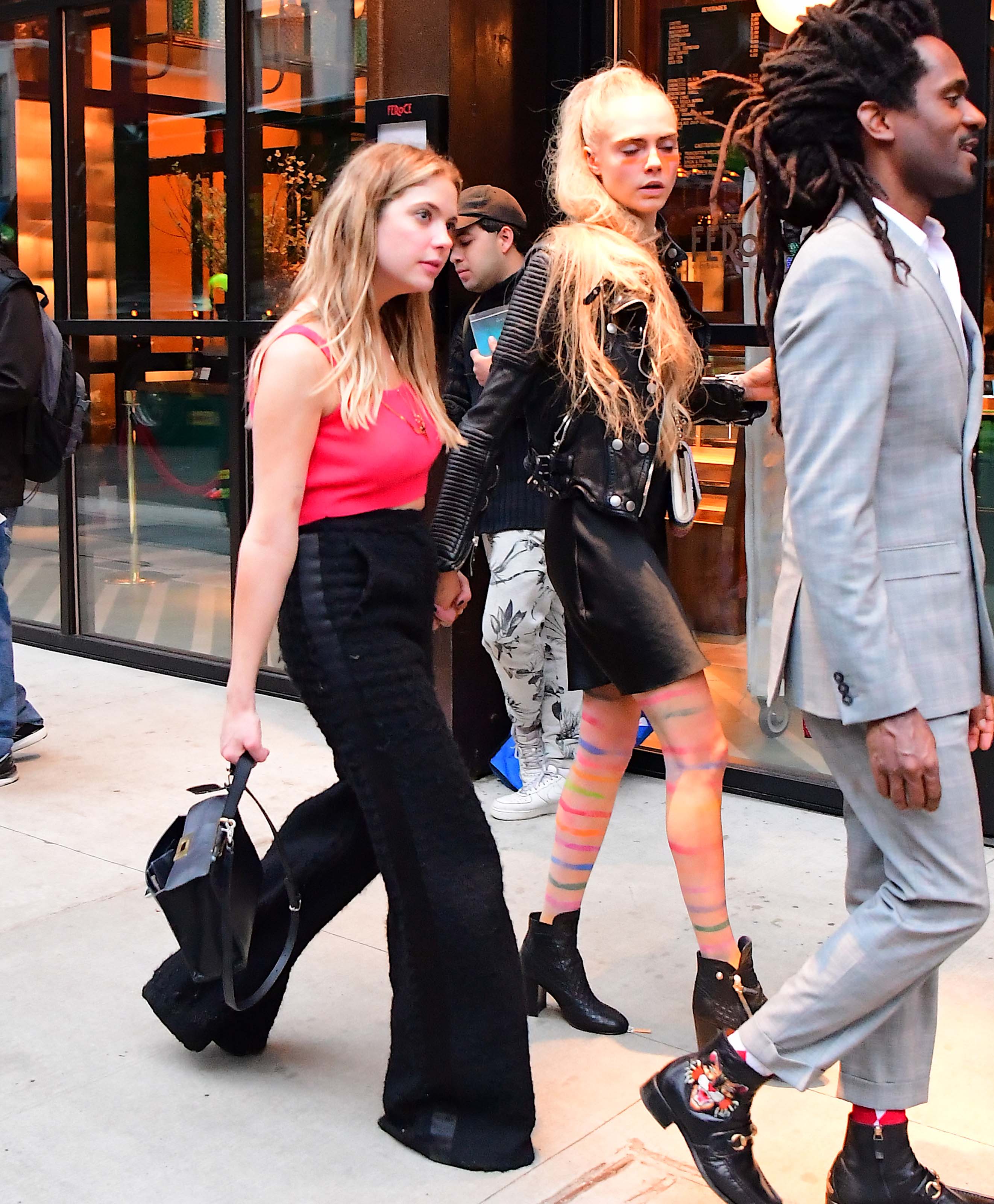 Ashley Benson & Cara Delevingne hold hands leaving Met Gala After Party