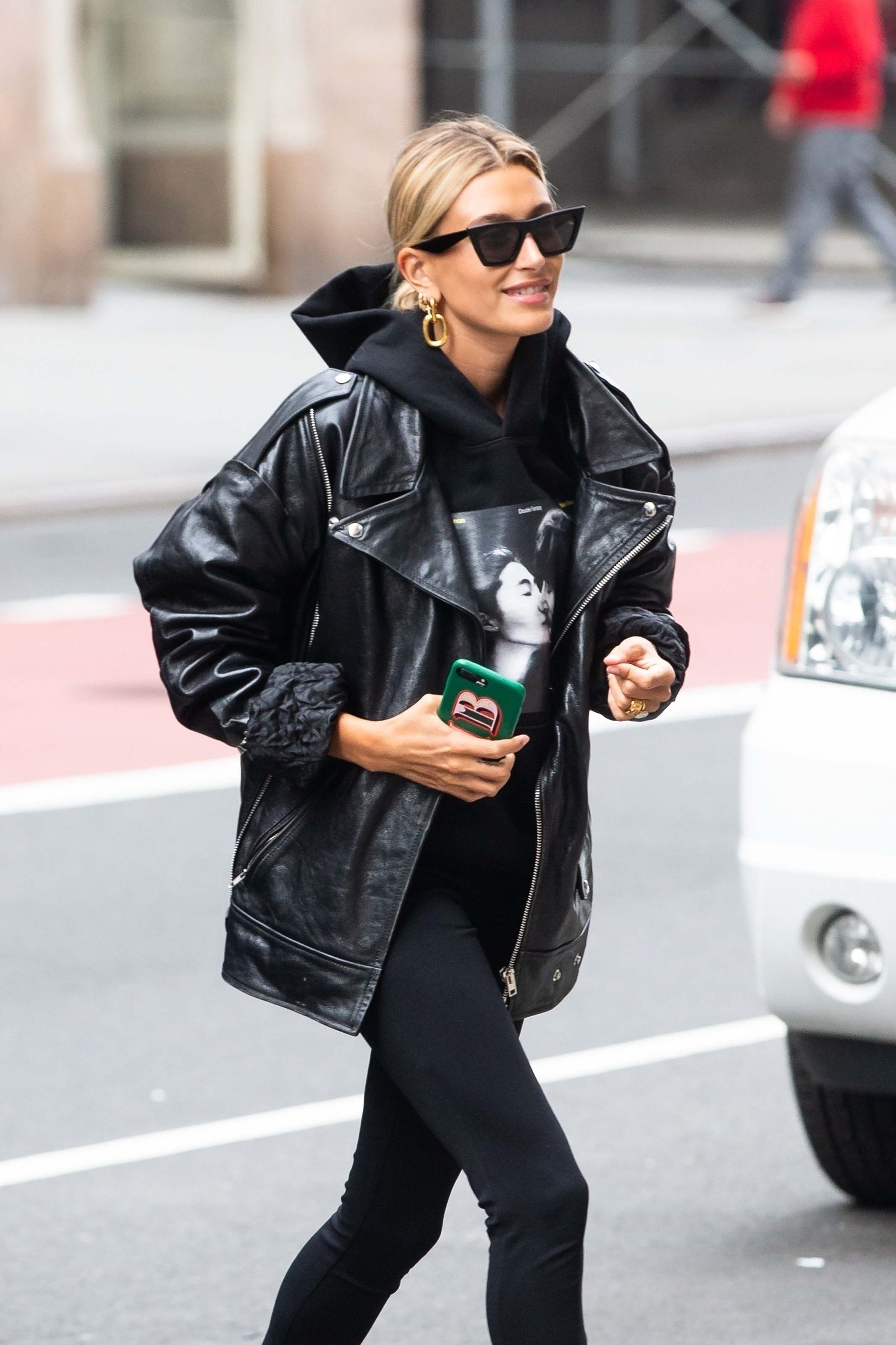 Hailey Baldwin arriving at an office building