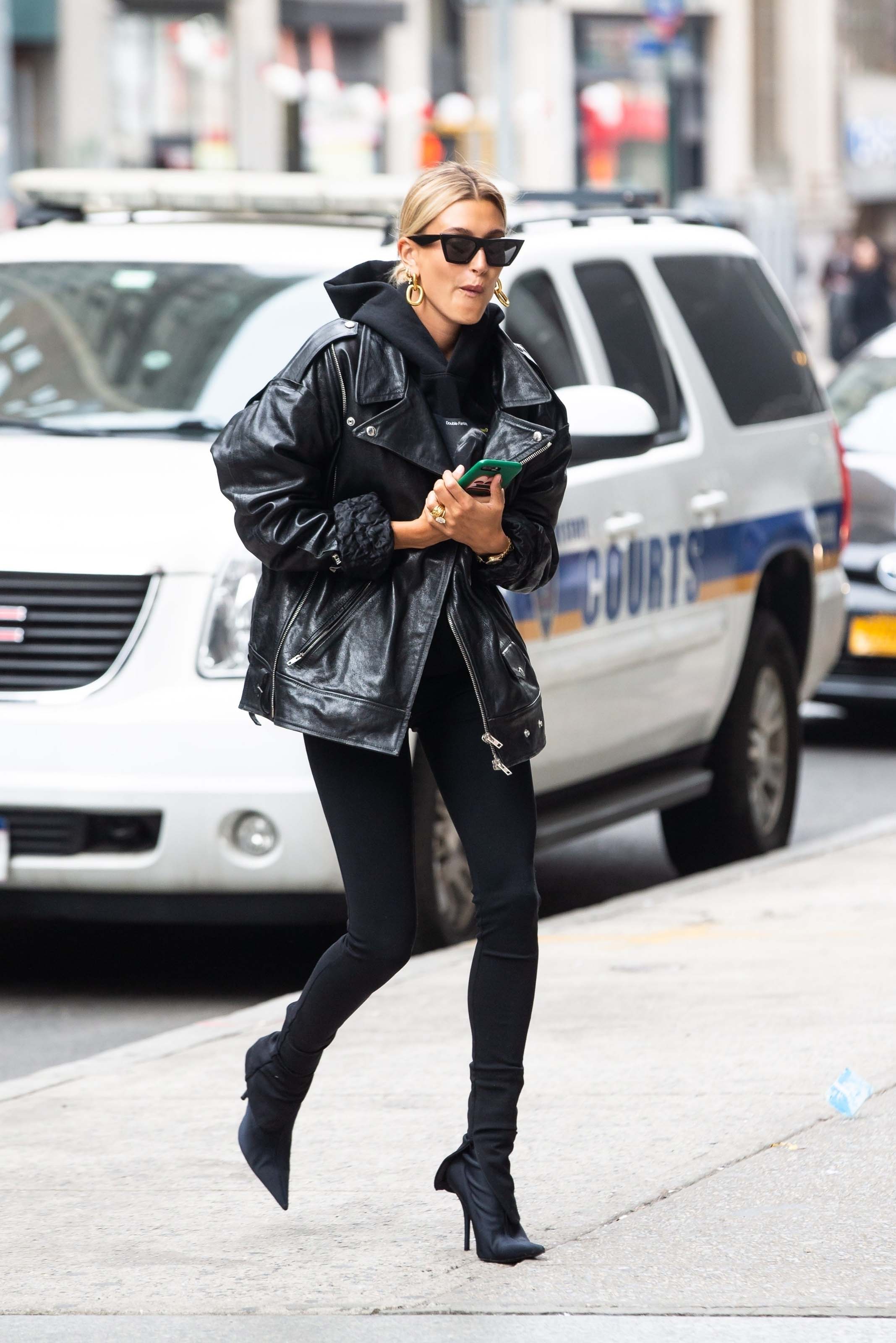 Hailey Baldwin arriving at an office building