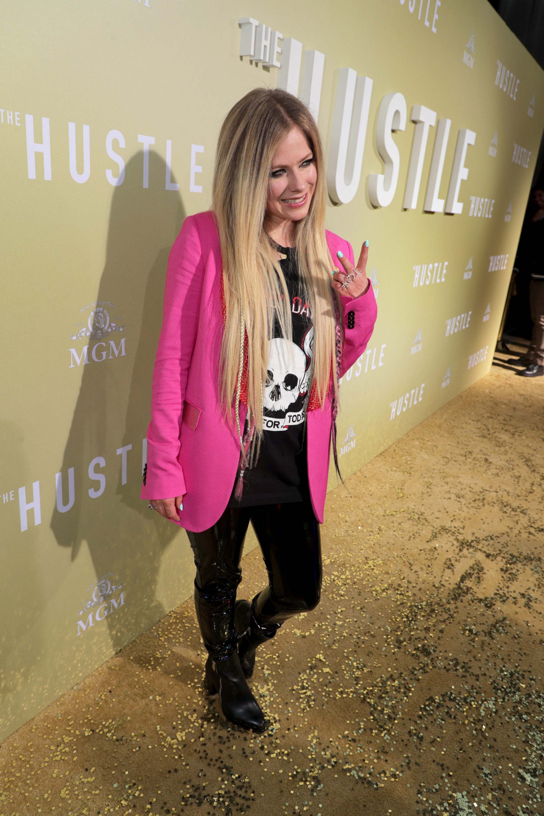 Avril Lavigne attends The Hustle premiere