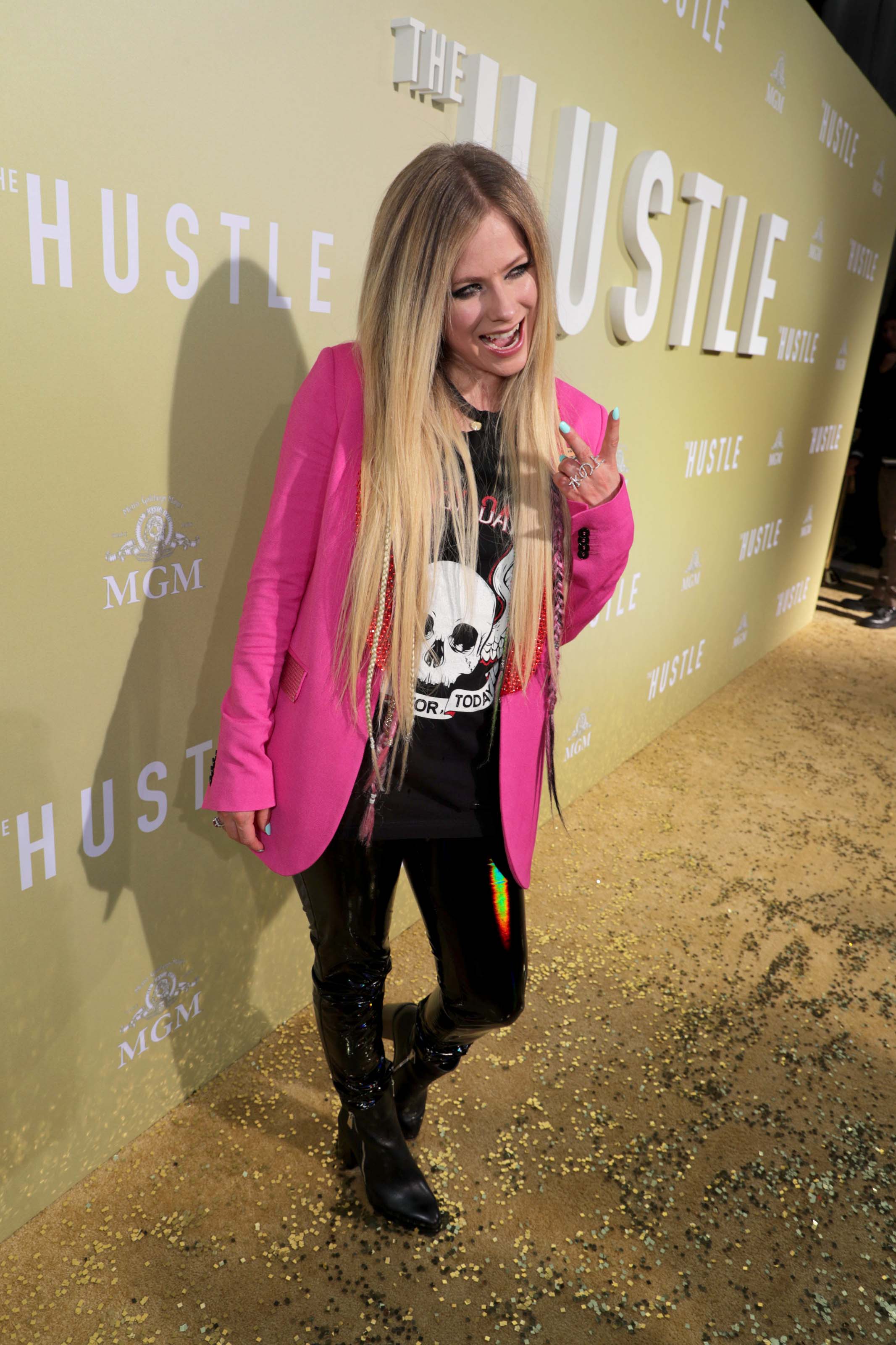 Avril Lavigne attends The Hustle premiere