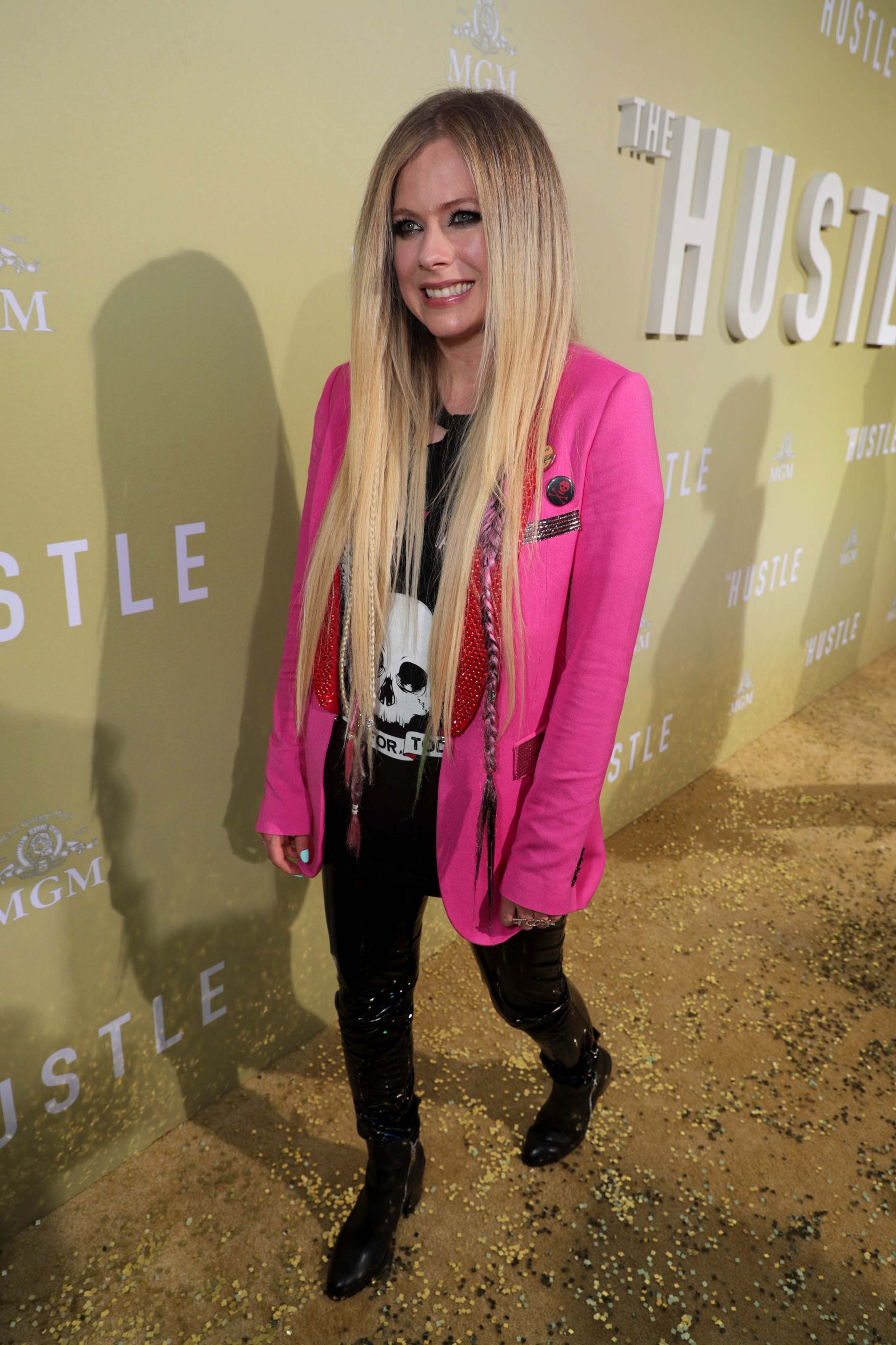 Avril Lavigne attends The Hustle premiere