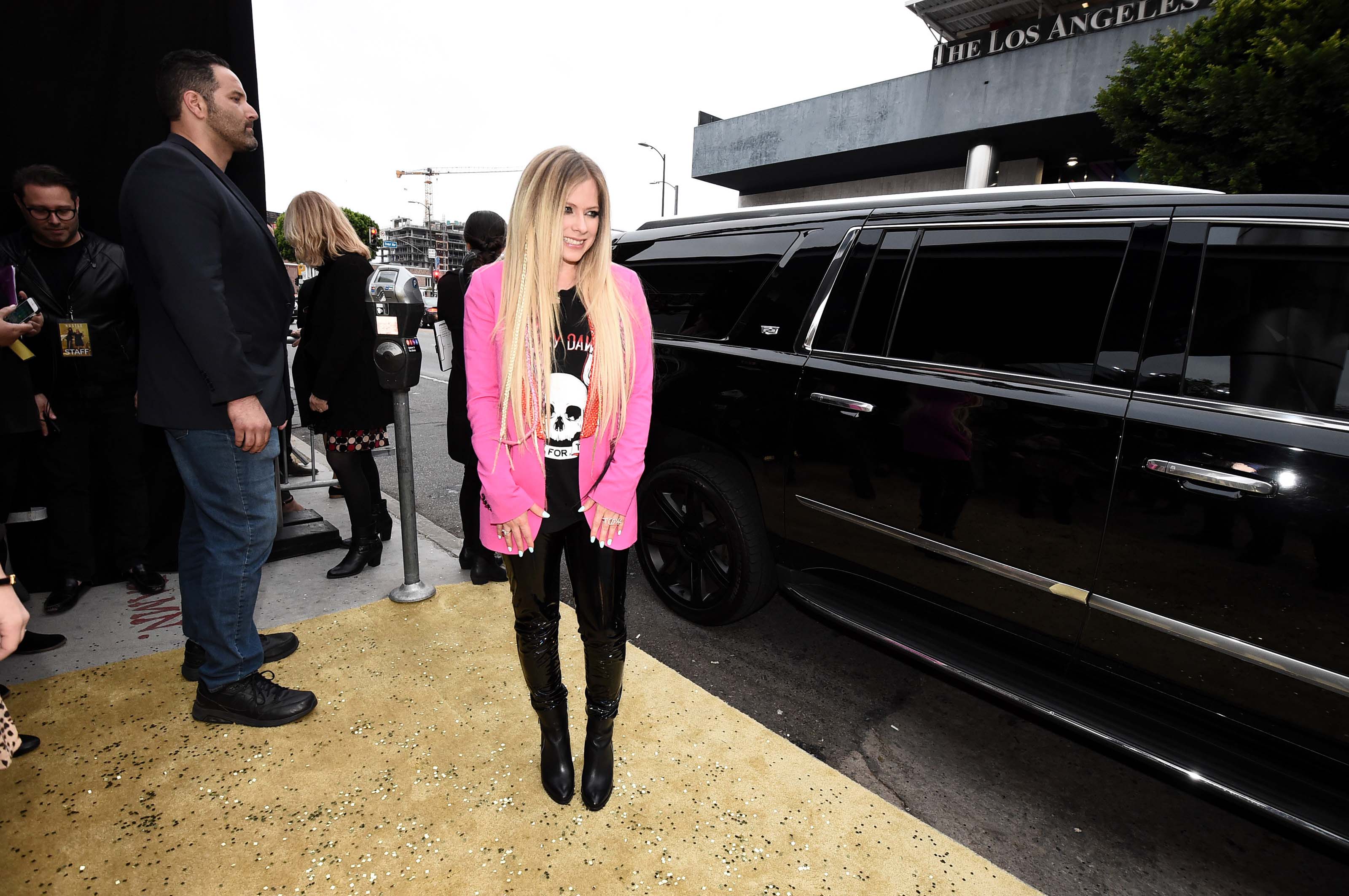 Avril Lavigne attends The Hustle premiere