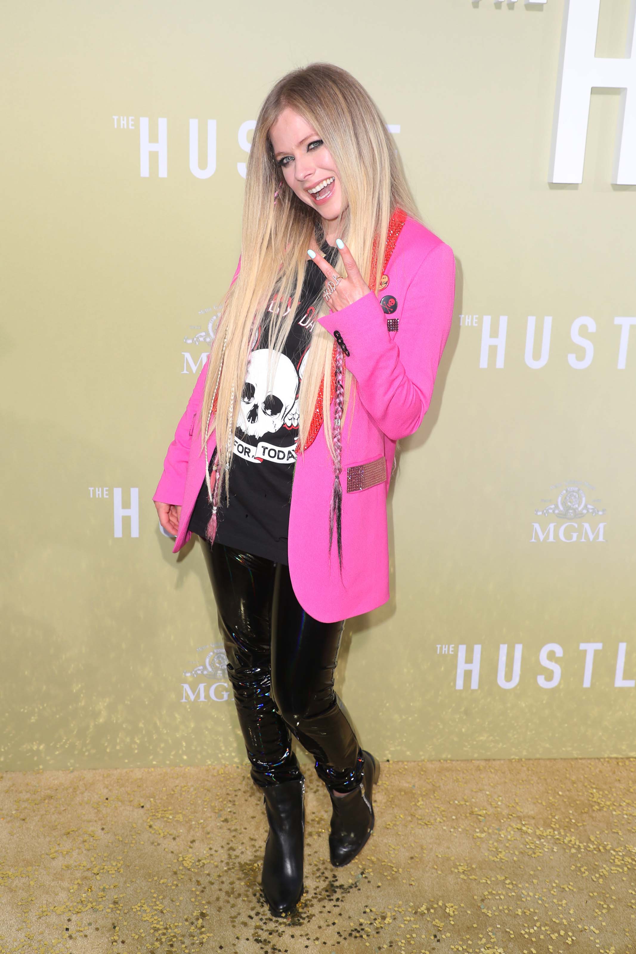 Avril Lavigne attends The Hustle premiere