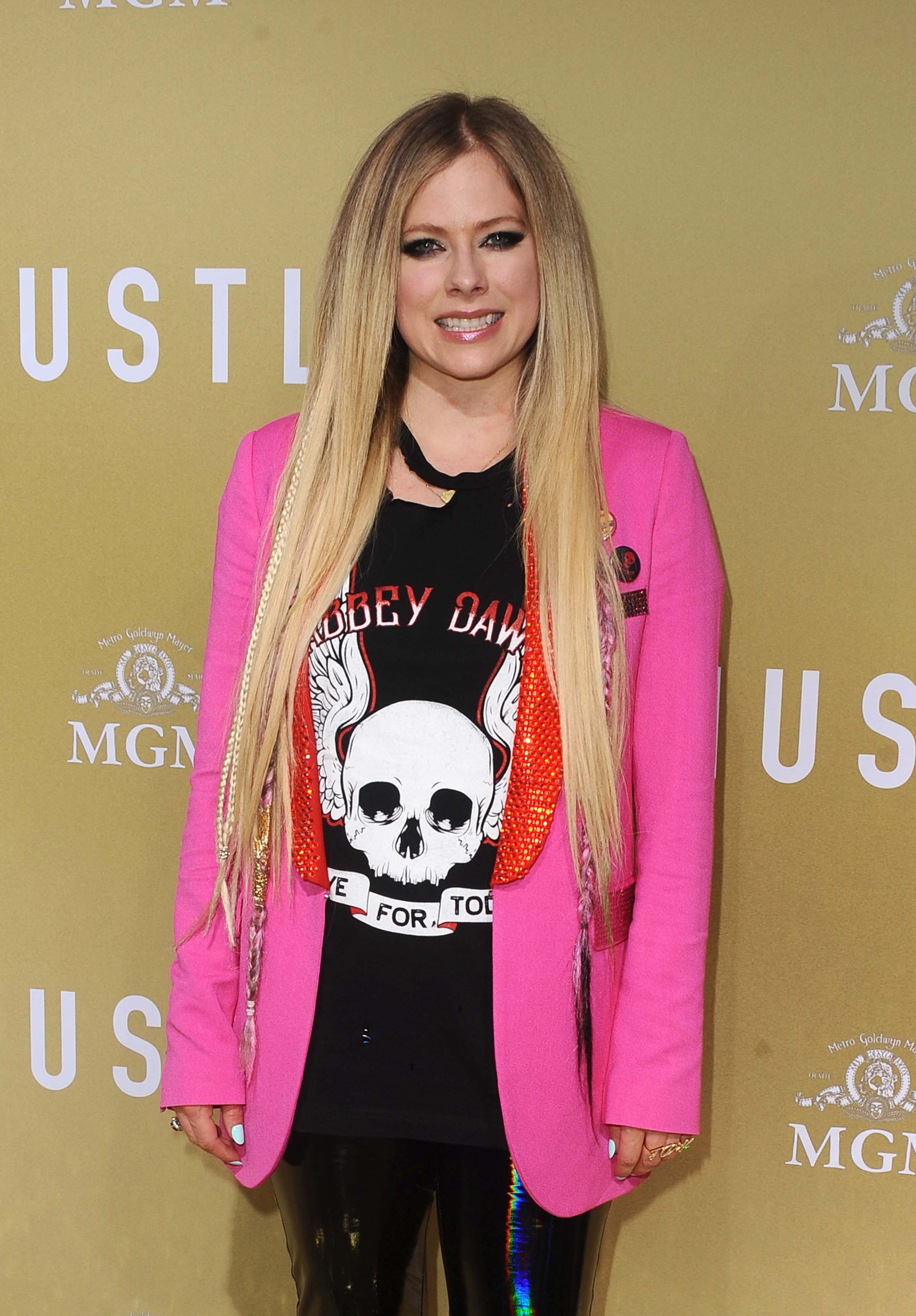 Avril Lavigne attends The Hustle premiere