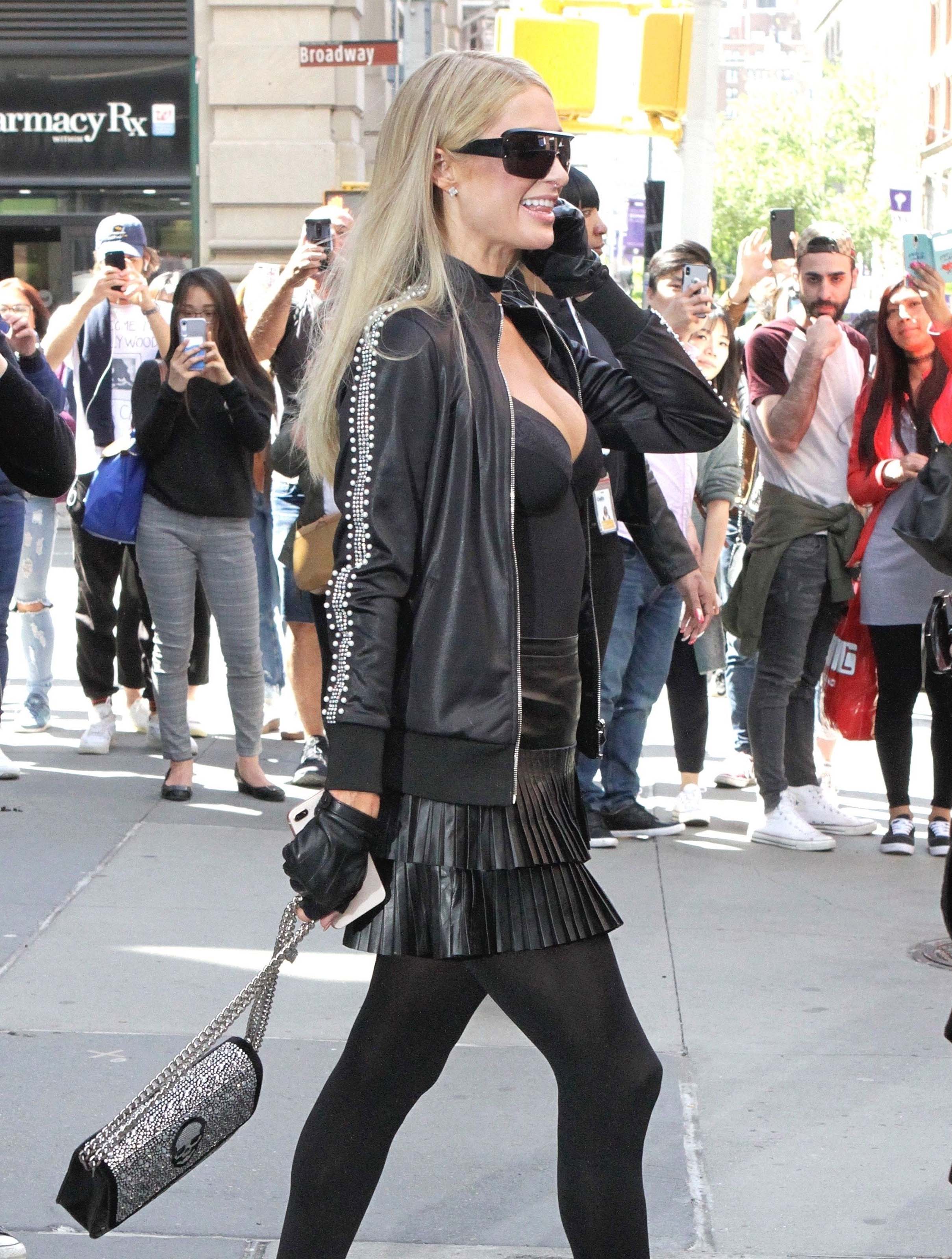 Paris Hilton arrives at the build series