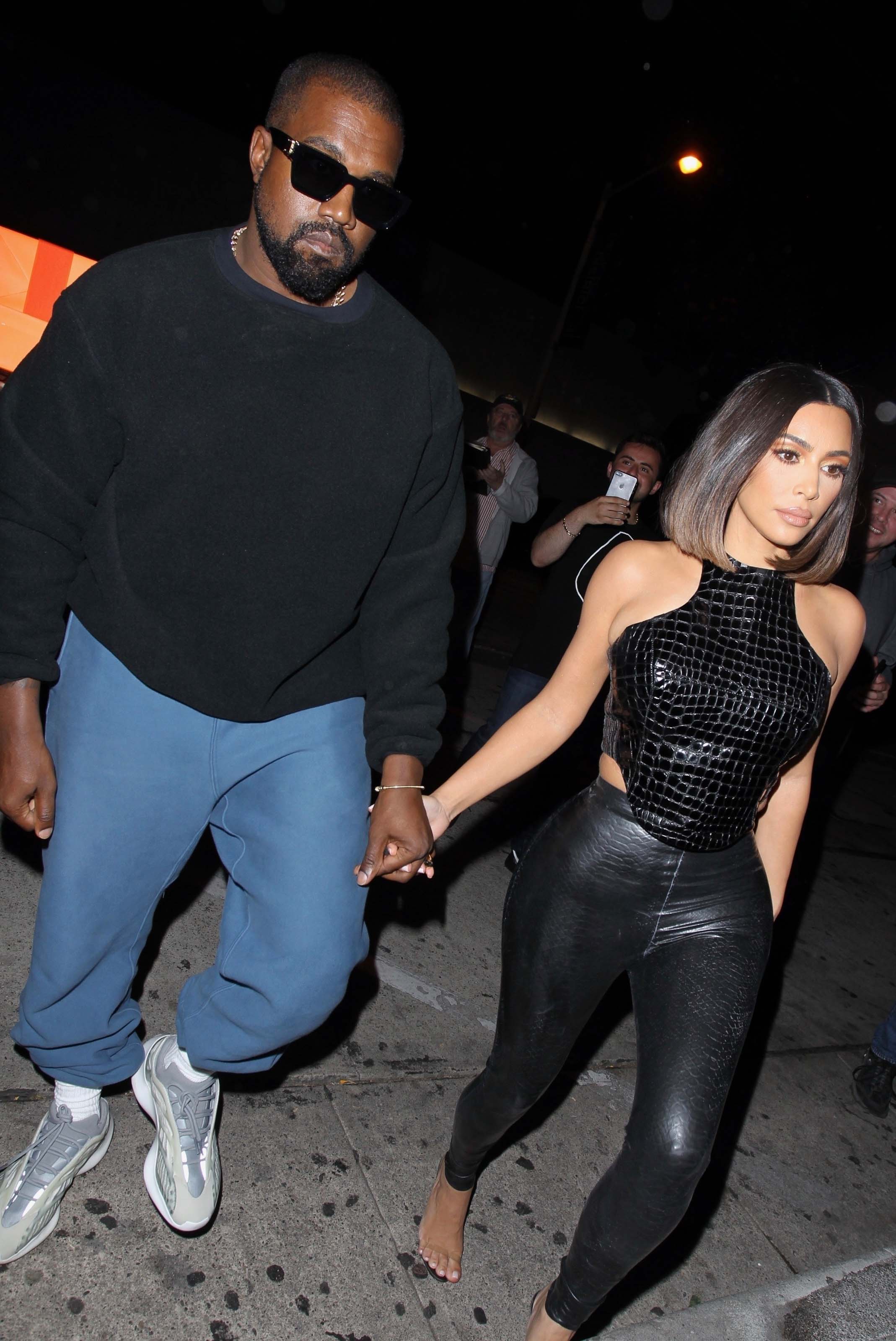 Kim Kardashian arrives at a dinner party at Craig’s