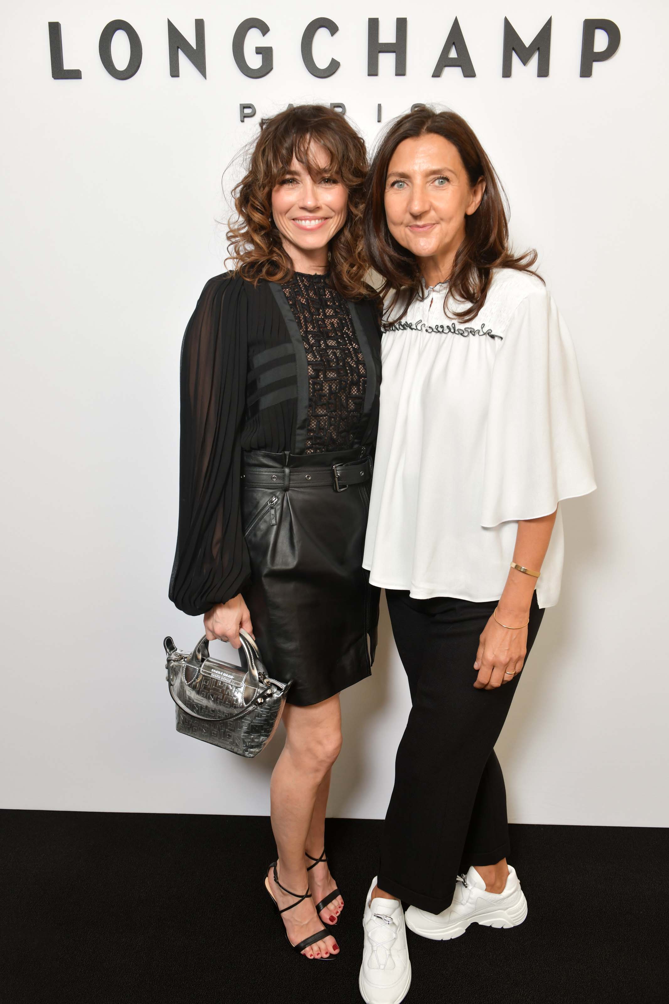 Linda Cardellini attends Longchamp show