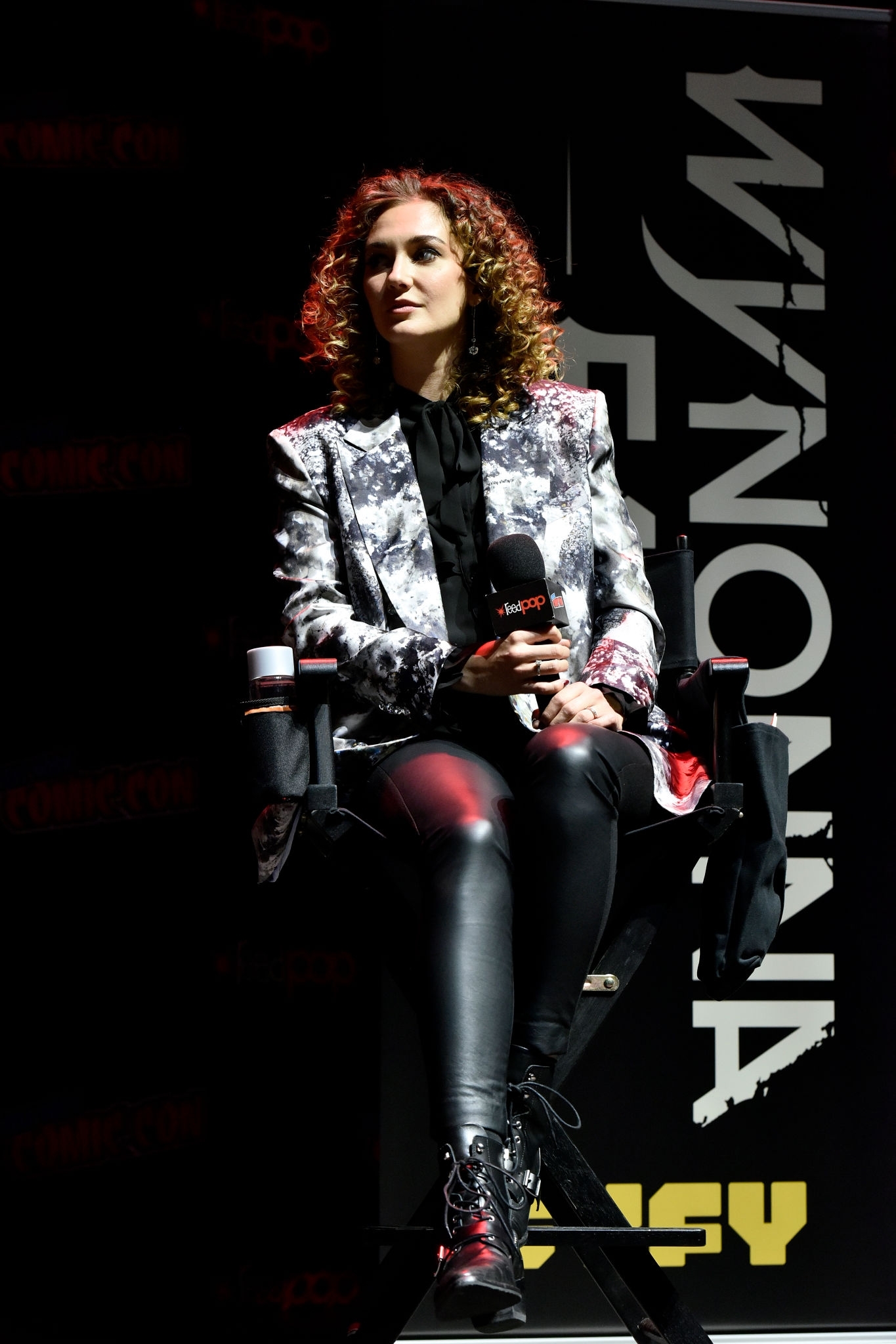 Katherine Barrell speaks on stage at SYFY & IDW Entertainment’s “Wynonna Earp”