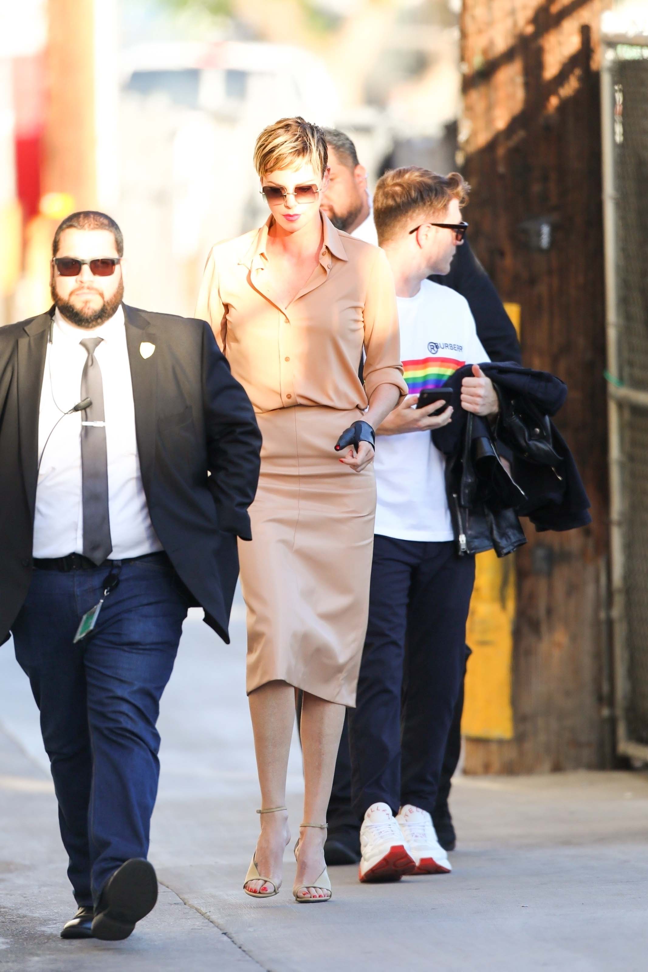 Charlize Theron makes a stylish arrival at Jimmy Kimmel Live