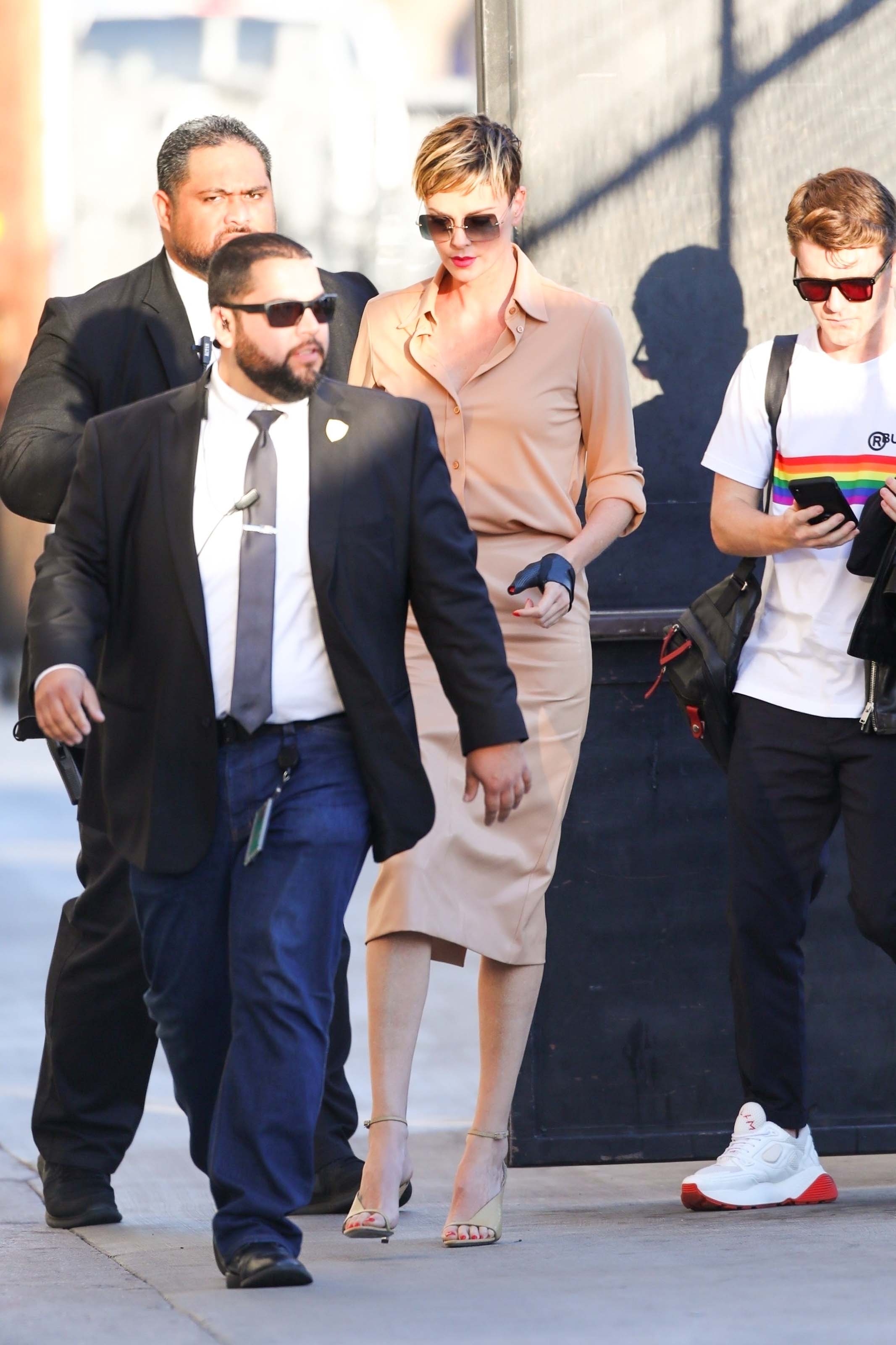 Charlize Theron makes a stylish arrival at Jimmy Kimmel Live