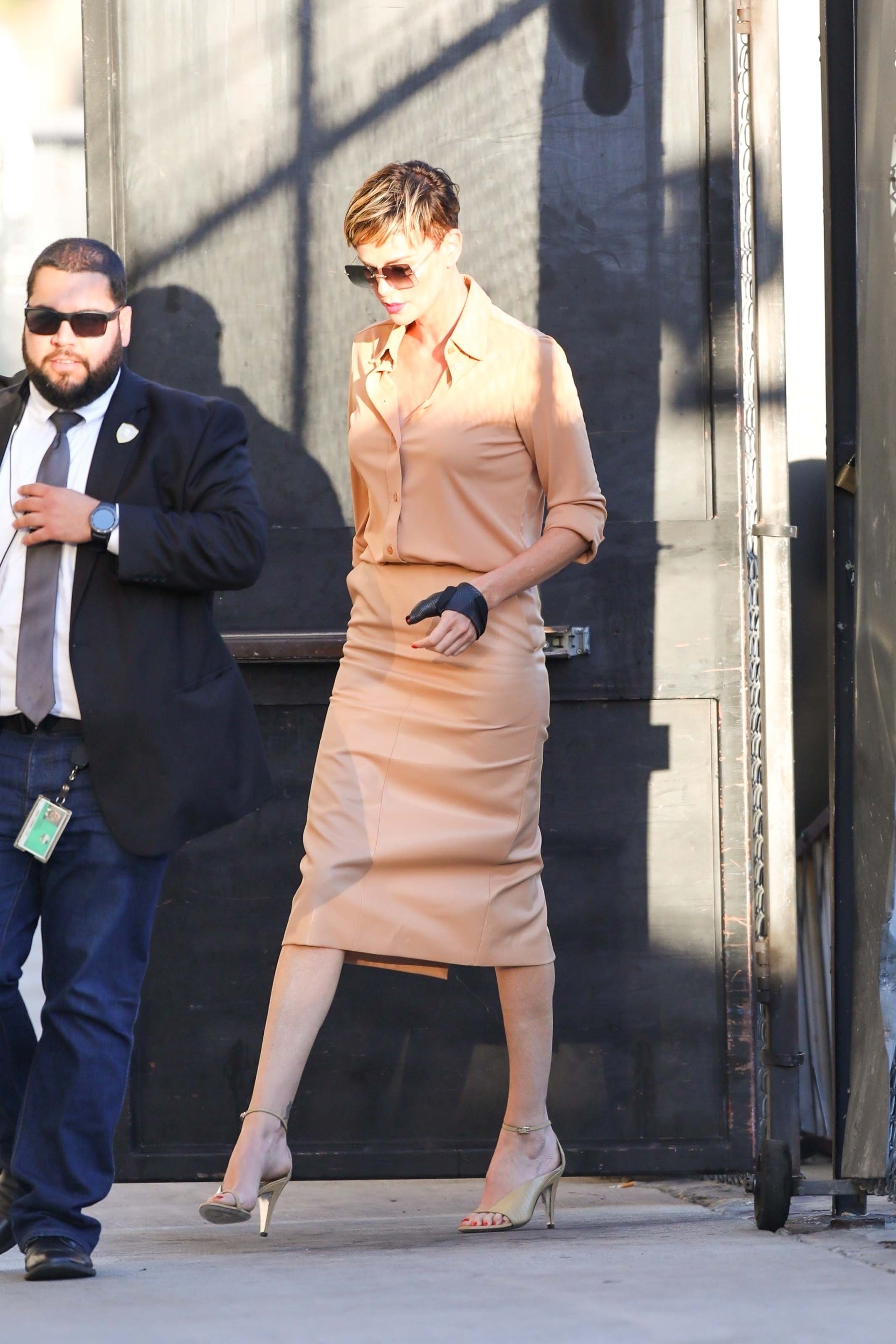 Charlize Theron makes a stylish arrival at Jimmy Kimmel Live