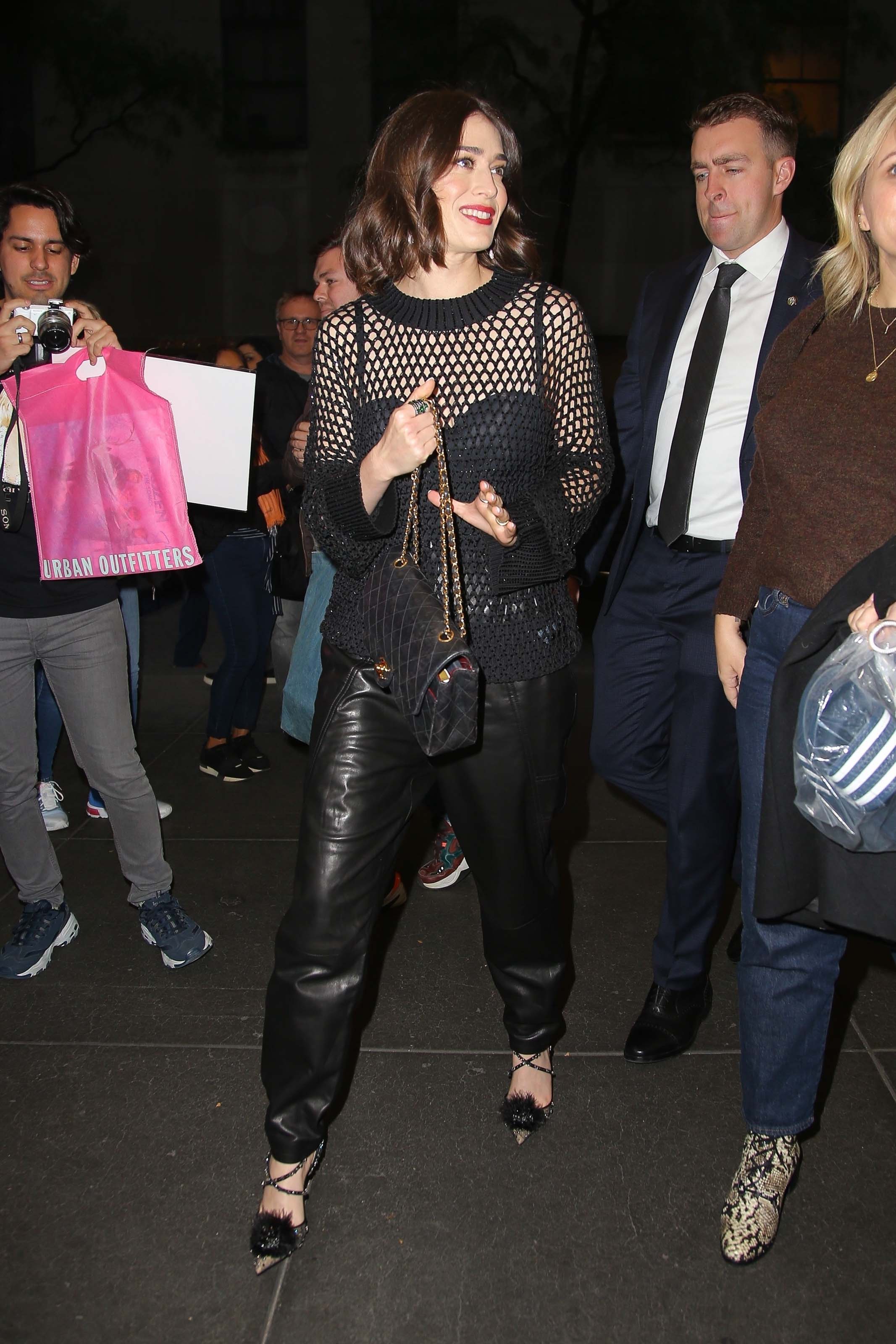 Lizzy Caplan looks stylish in a leather pants