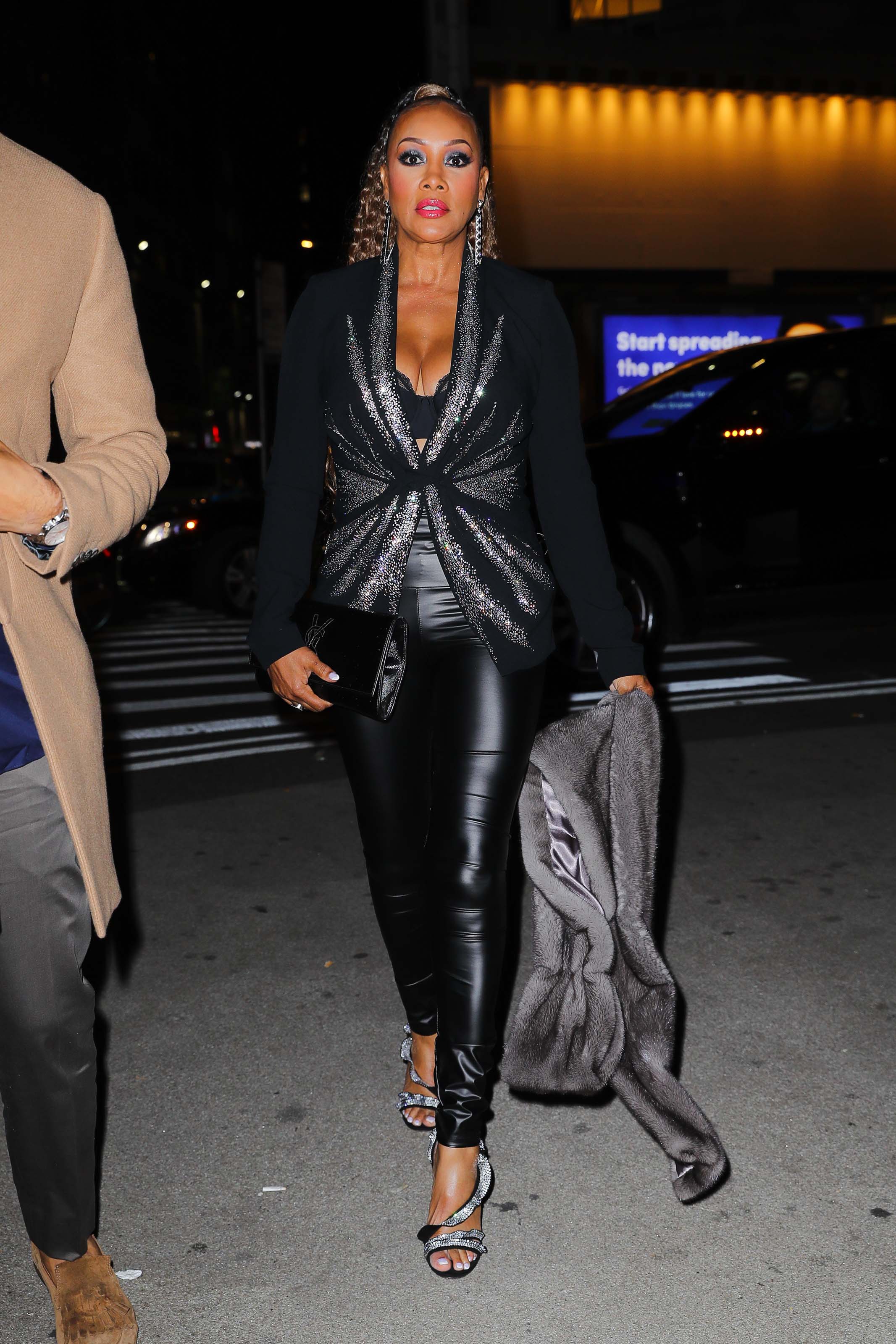 Vivica A Fox leather leggings while arrives at the Ovarian Cancer Research Alliance