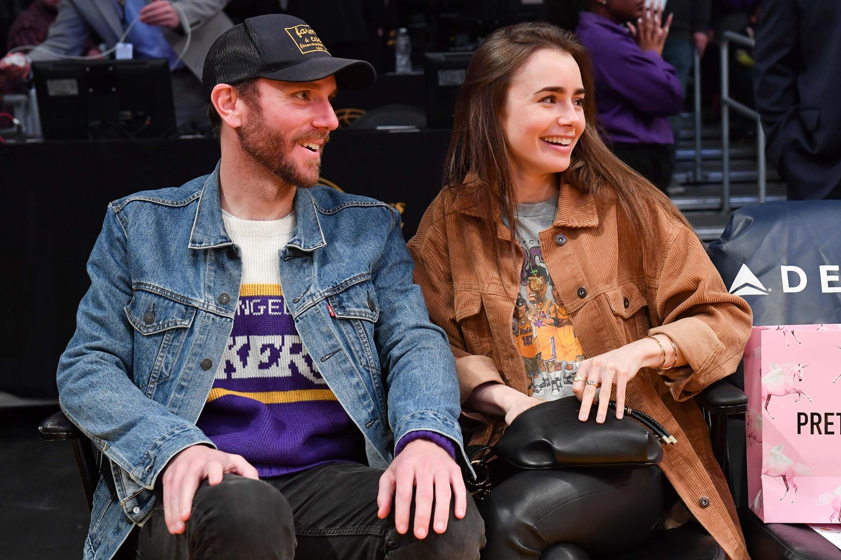 Lily Collins at a Los Angeles Lakers game
