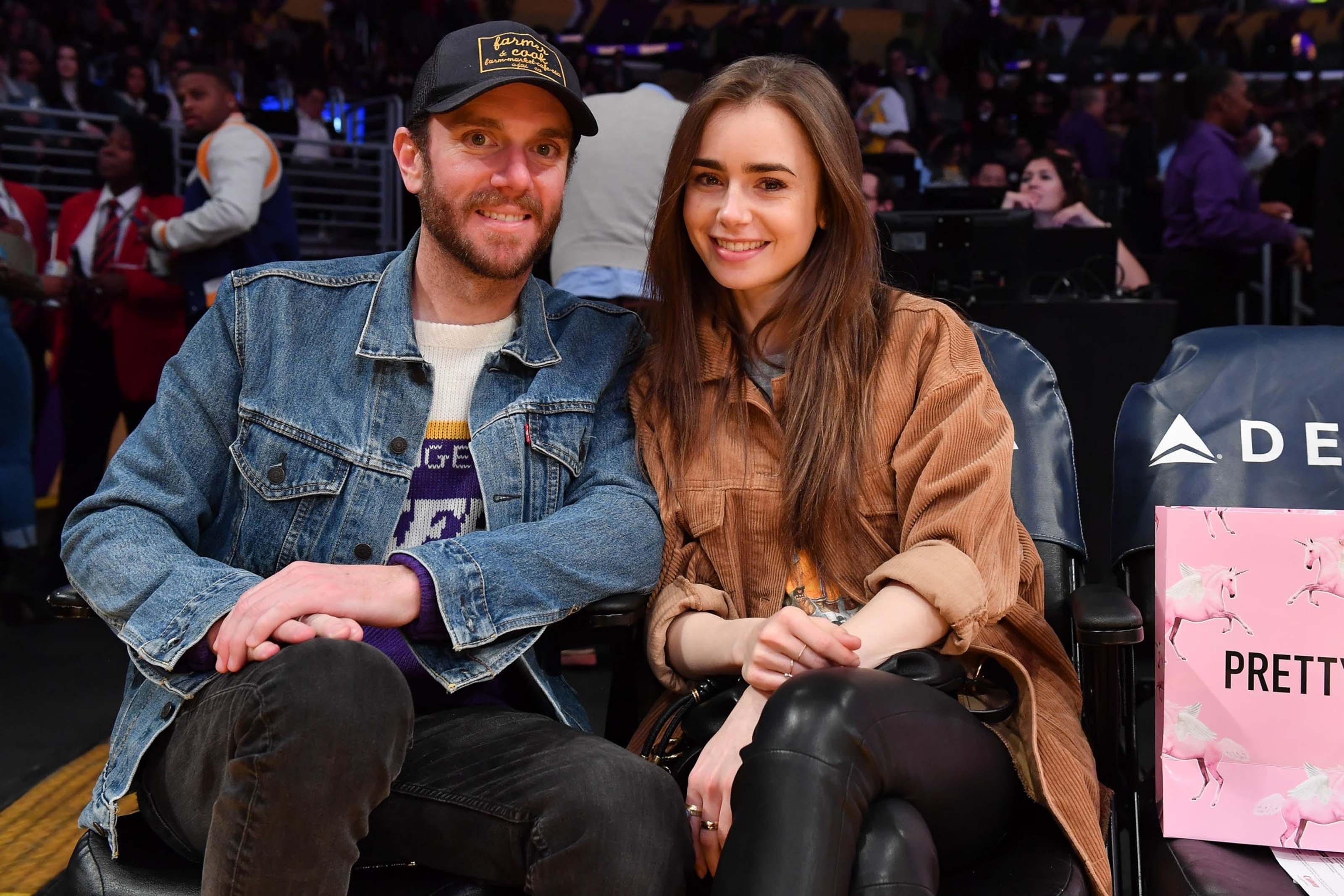 Lily Collins at a Los Angeles Lakers game