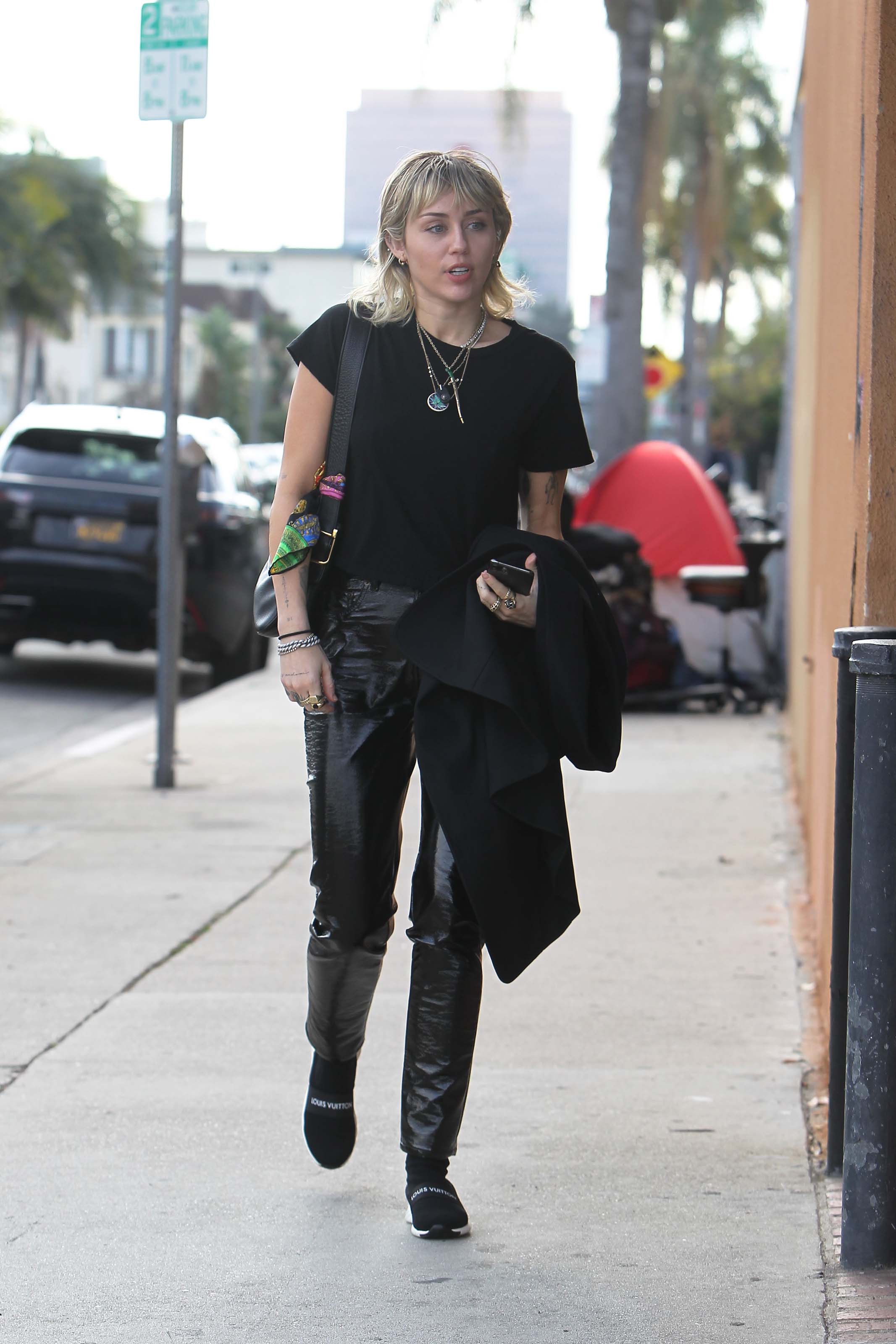 Miley Cyrus arrives at a studio