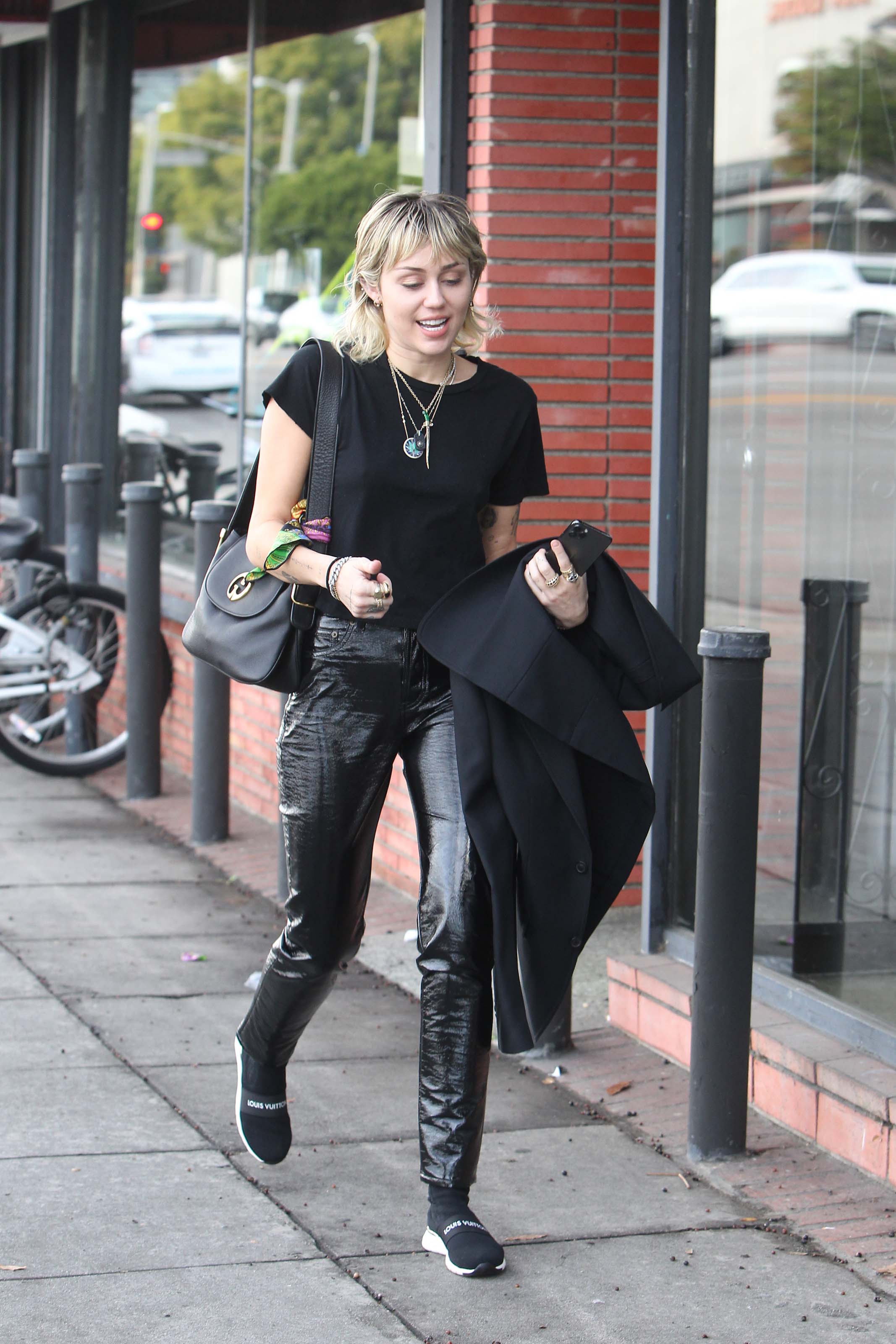 Miley Cyrus arrives at a studio