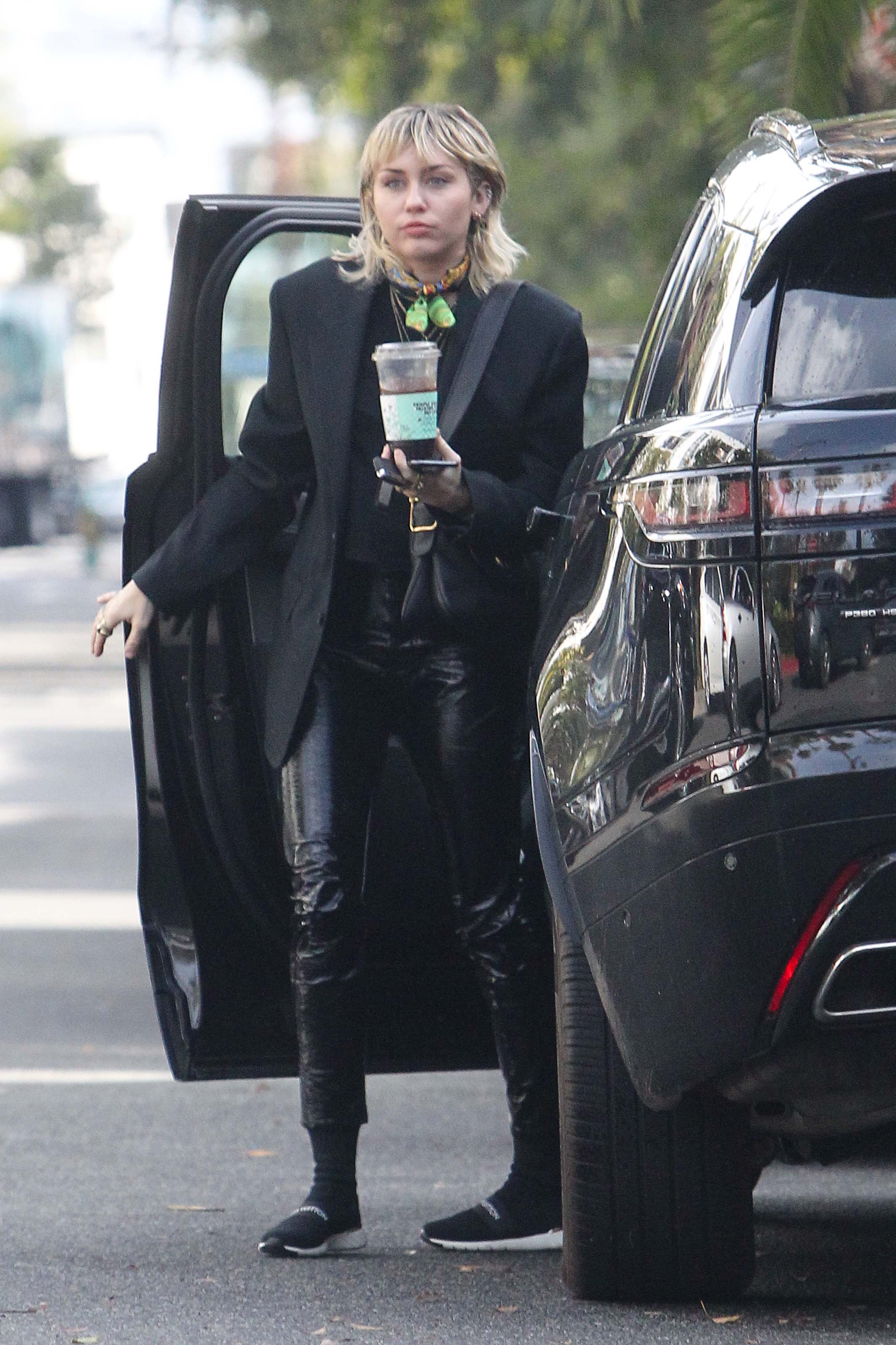 Miley Cyrus arrives at a studio