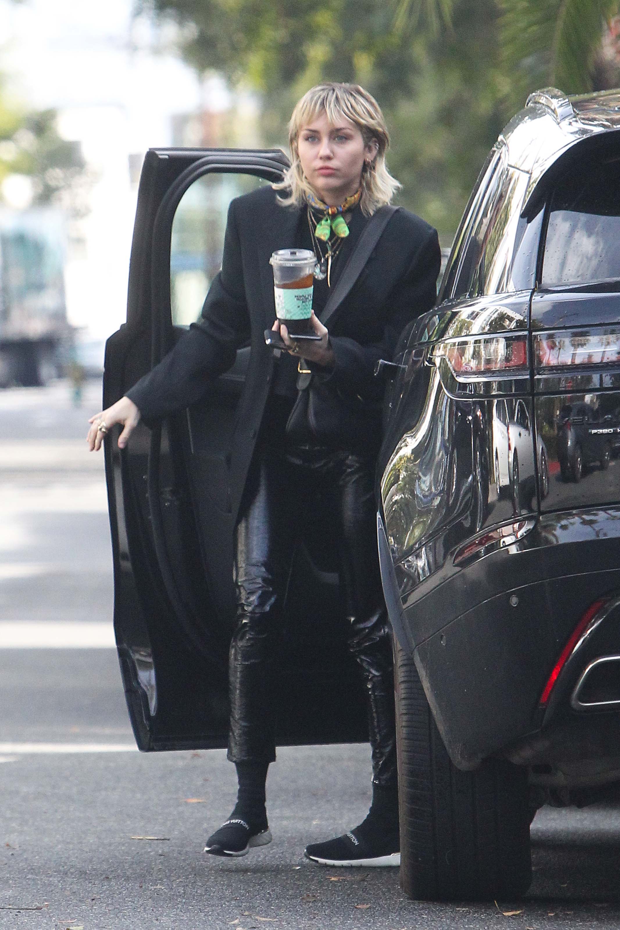 Miley Cyrus arrives at a studio