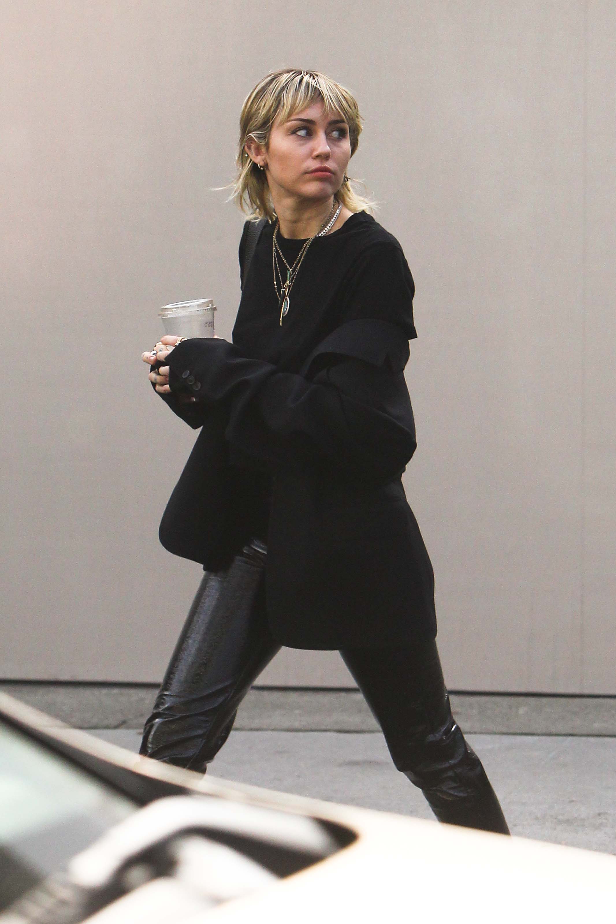 Miley Cyrus arrives at a studio