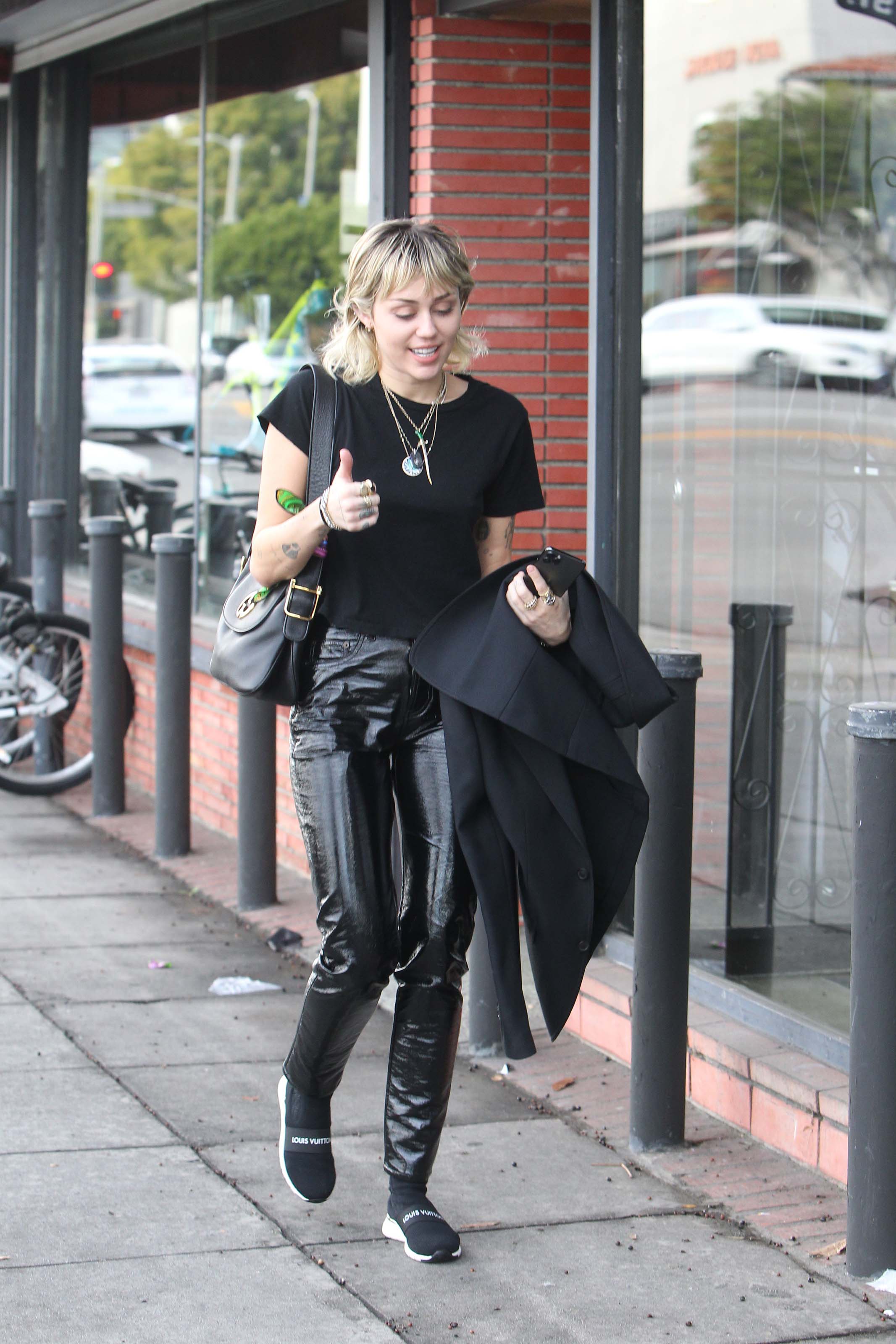 Miley Cyrus arrives at a studio