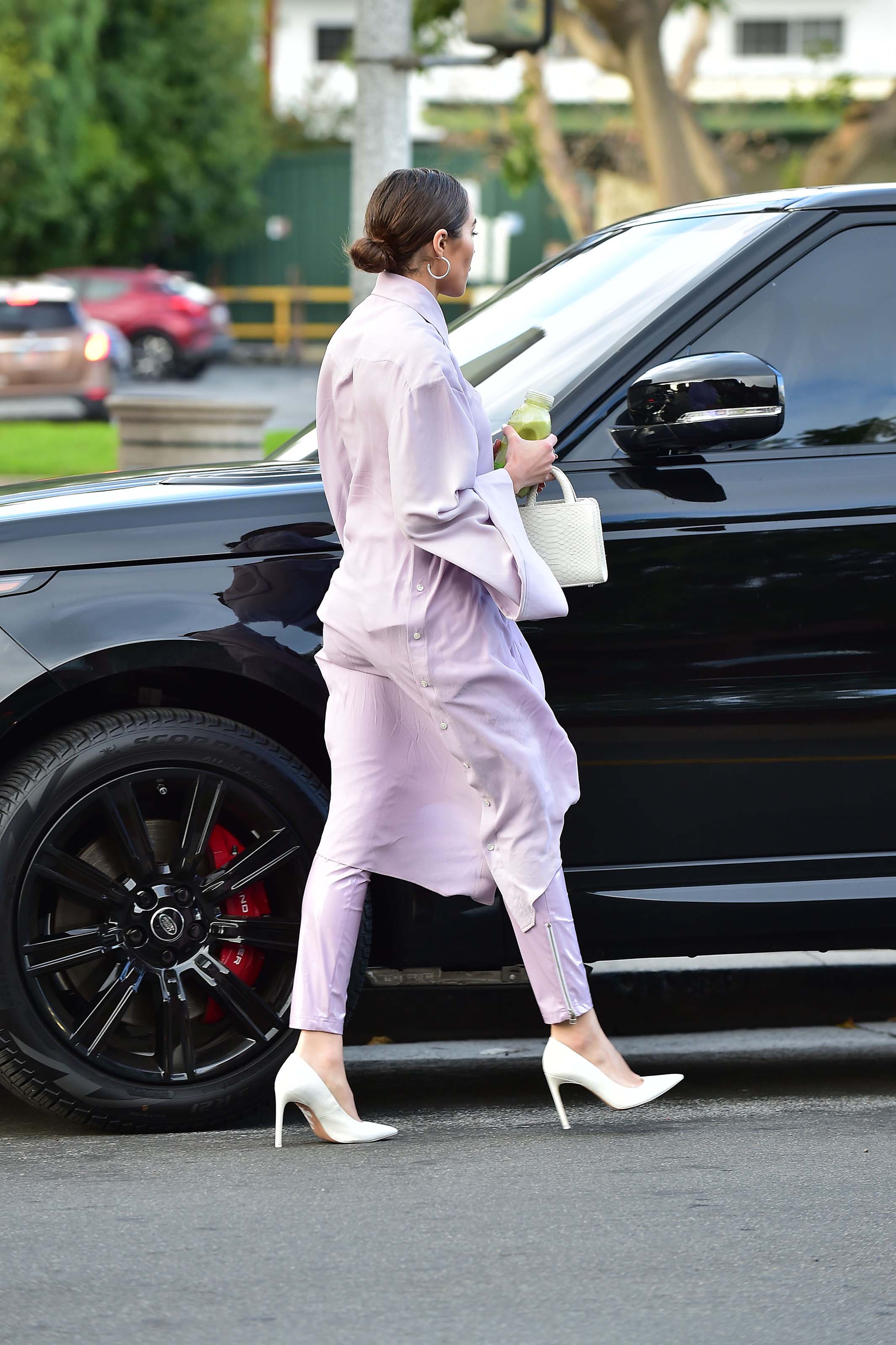 Olivia Culpo leaving a meeting