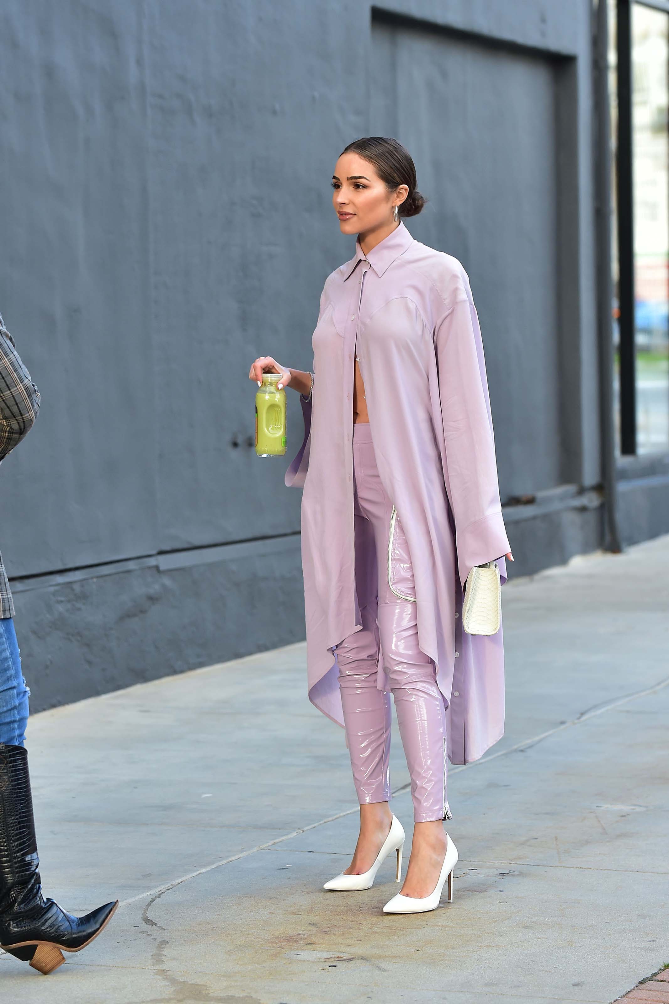 Olivia Culpo leaving a meeting