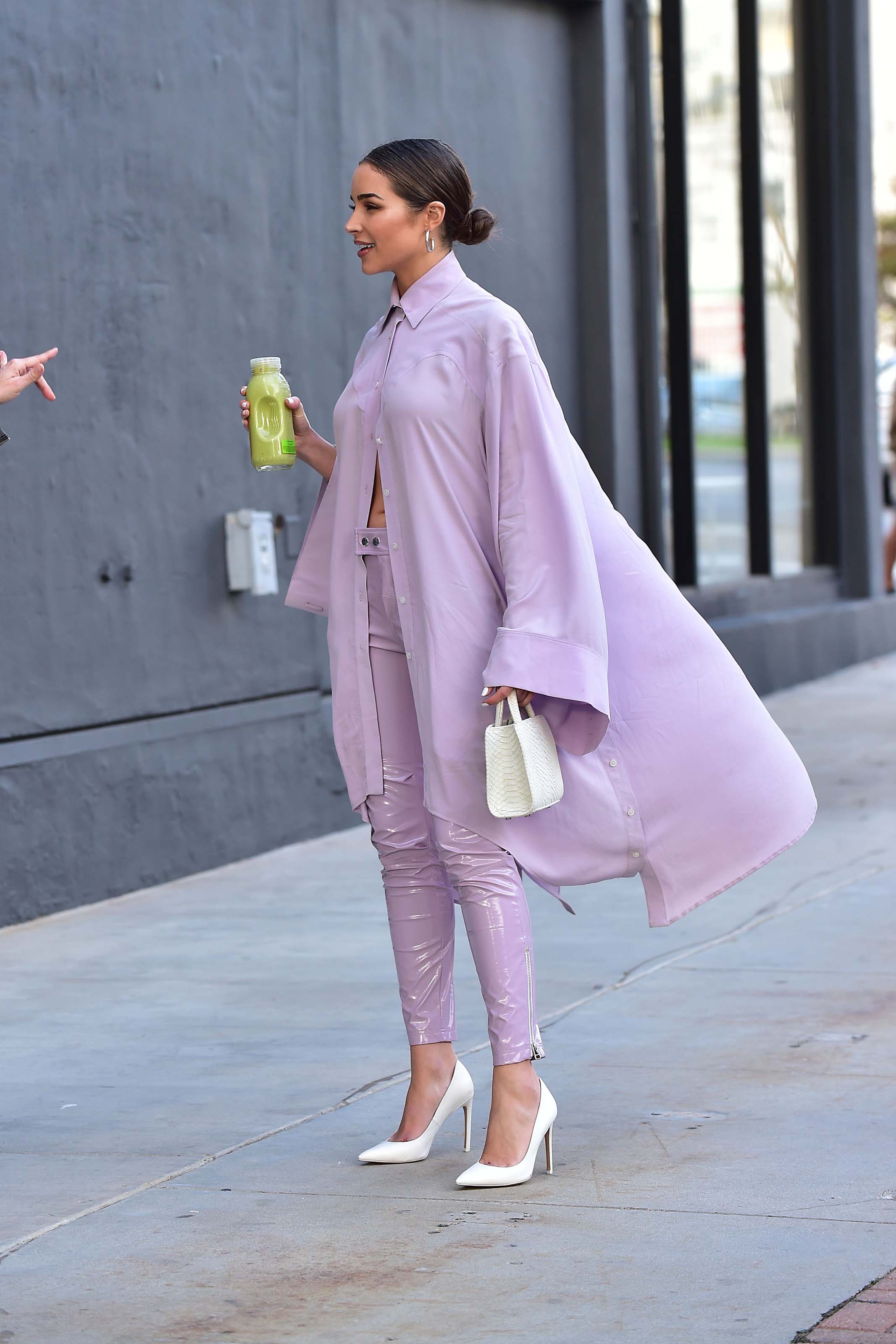 Olivia Culpo leaving a meeting