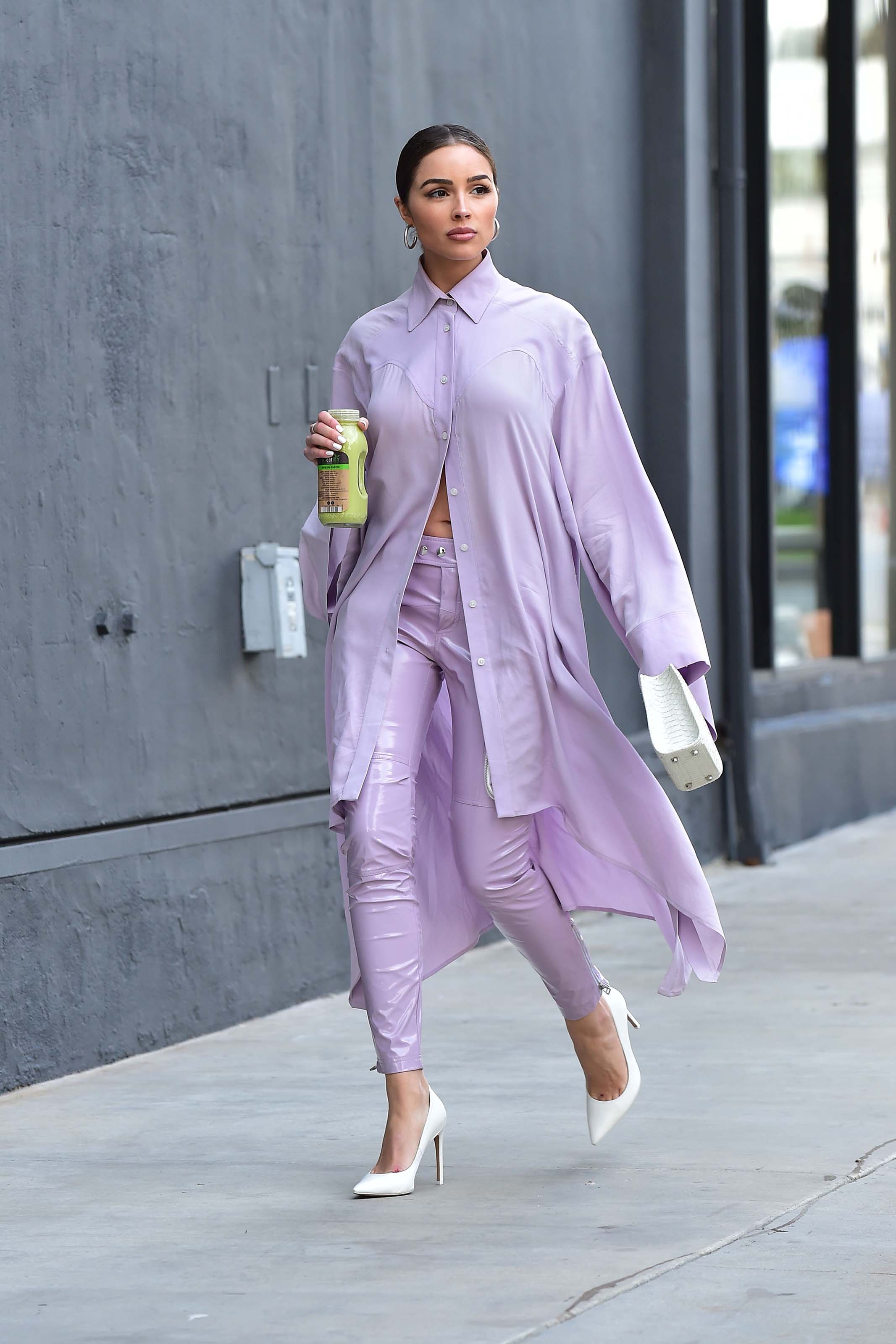 Olivia Culpo leaving a meeting