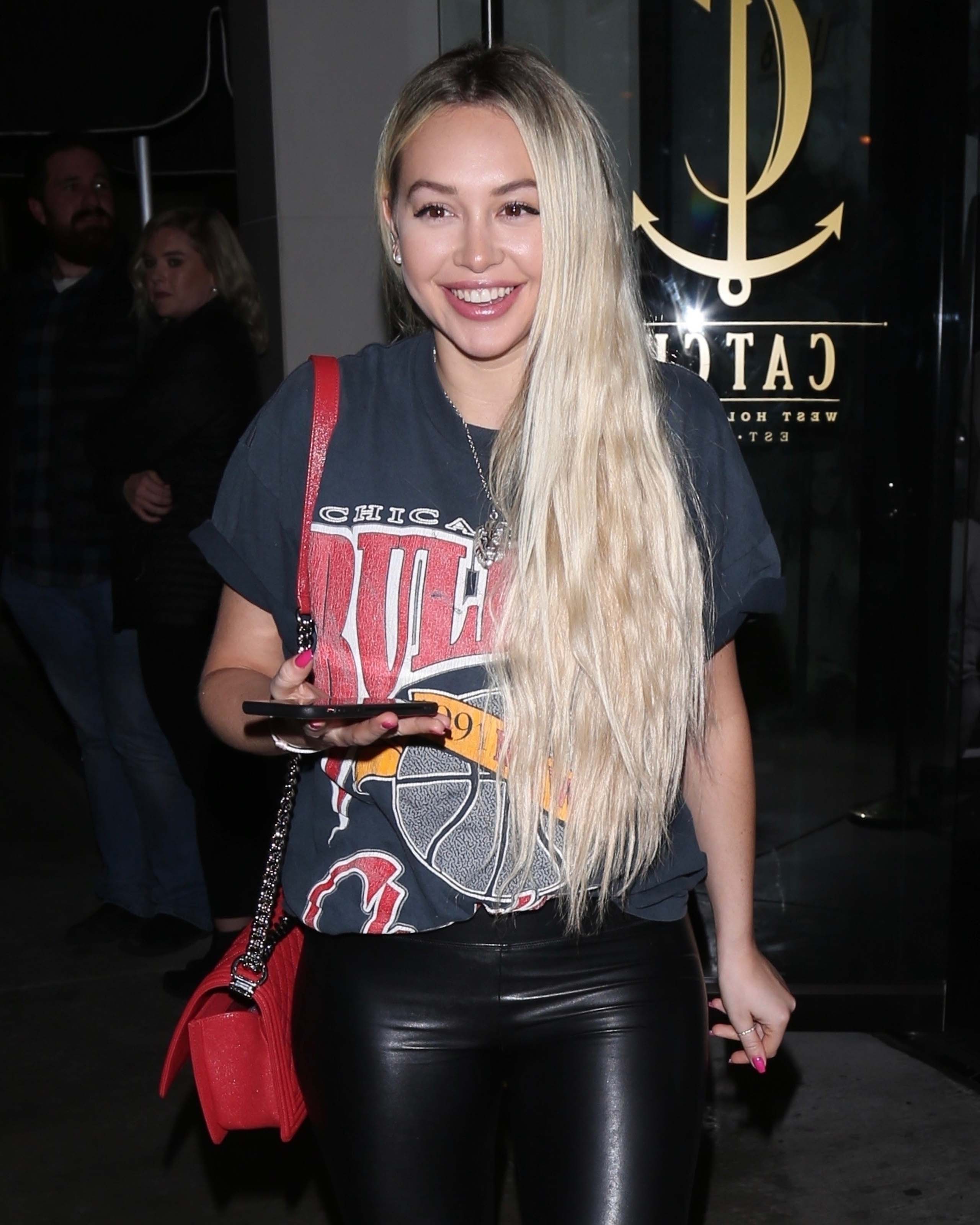 Corrine Olympios is all smiles while leaving Catch restaurant