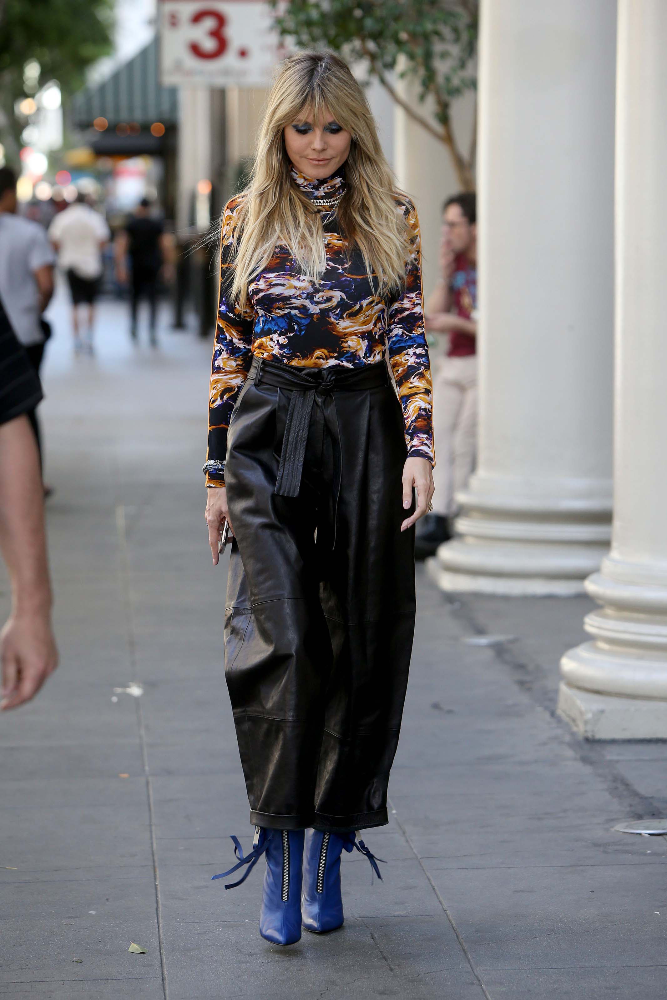 Heidi Klum walking to the Germany’s Next Topmodel set