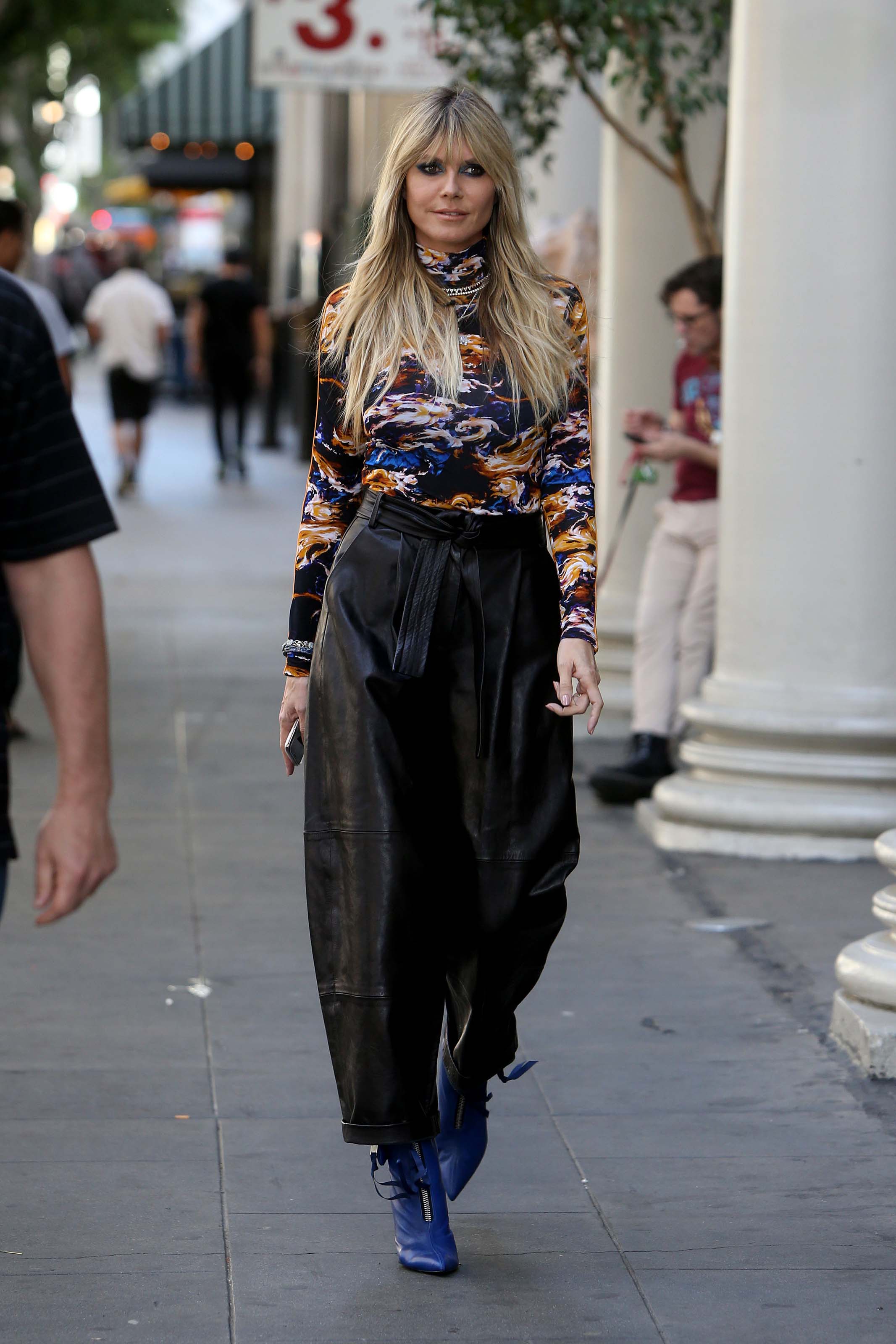 Heidi Klum walking to the Germany’s Next Topmodel set