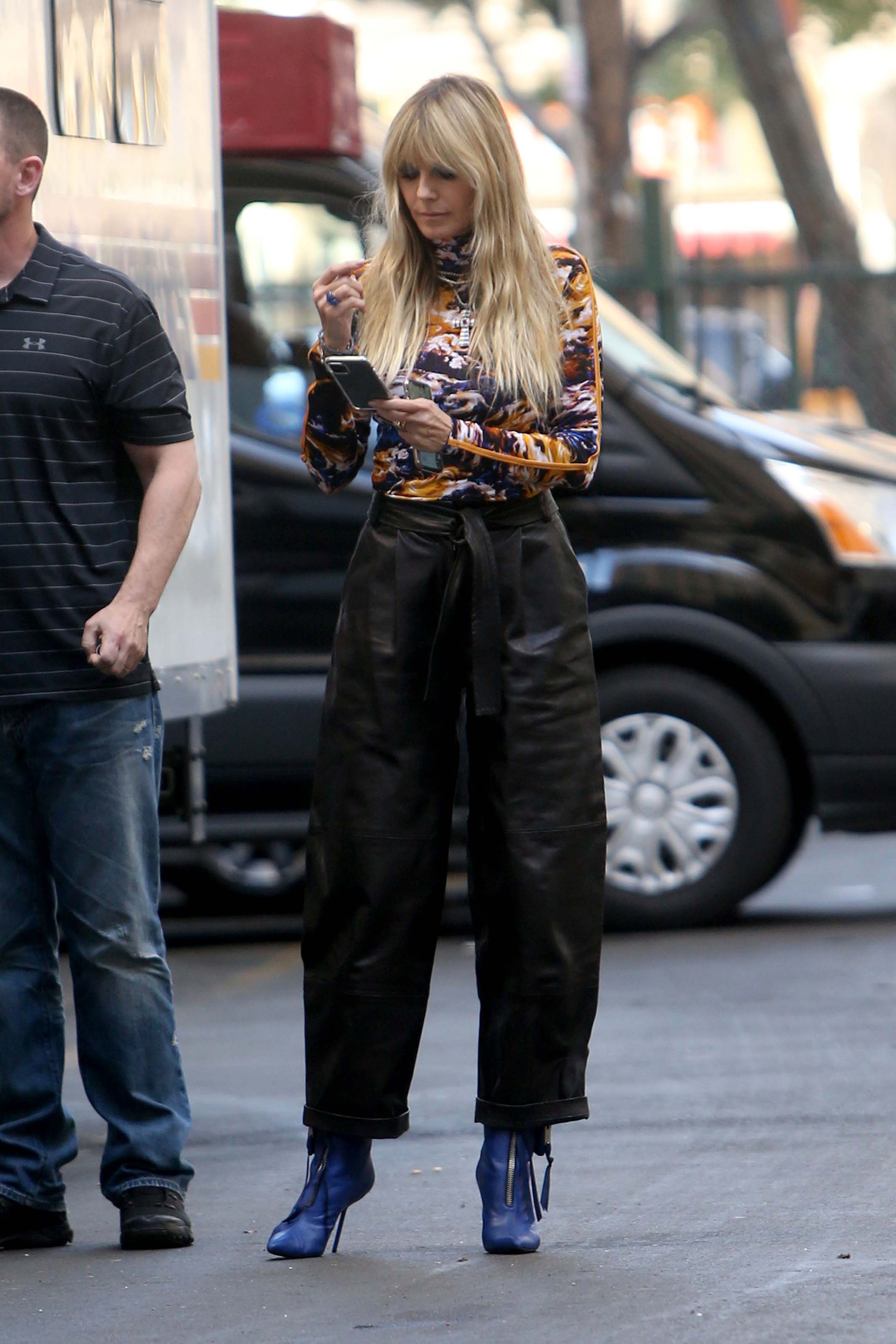 Heidi Klum walking to the Germany’s Next Topmodel set