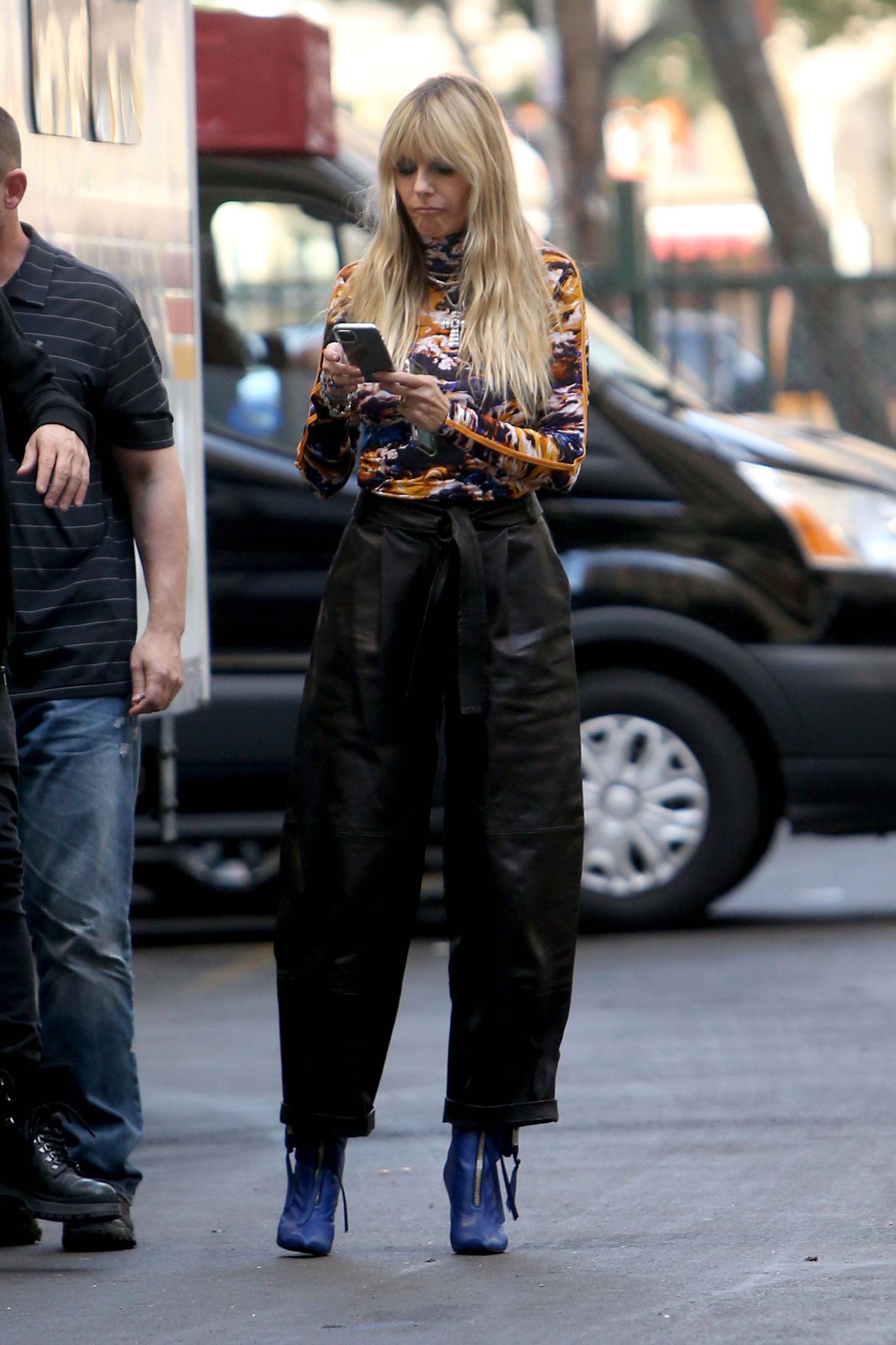 Heidi Klum walking to the Germany’s Next Topmodel set