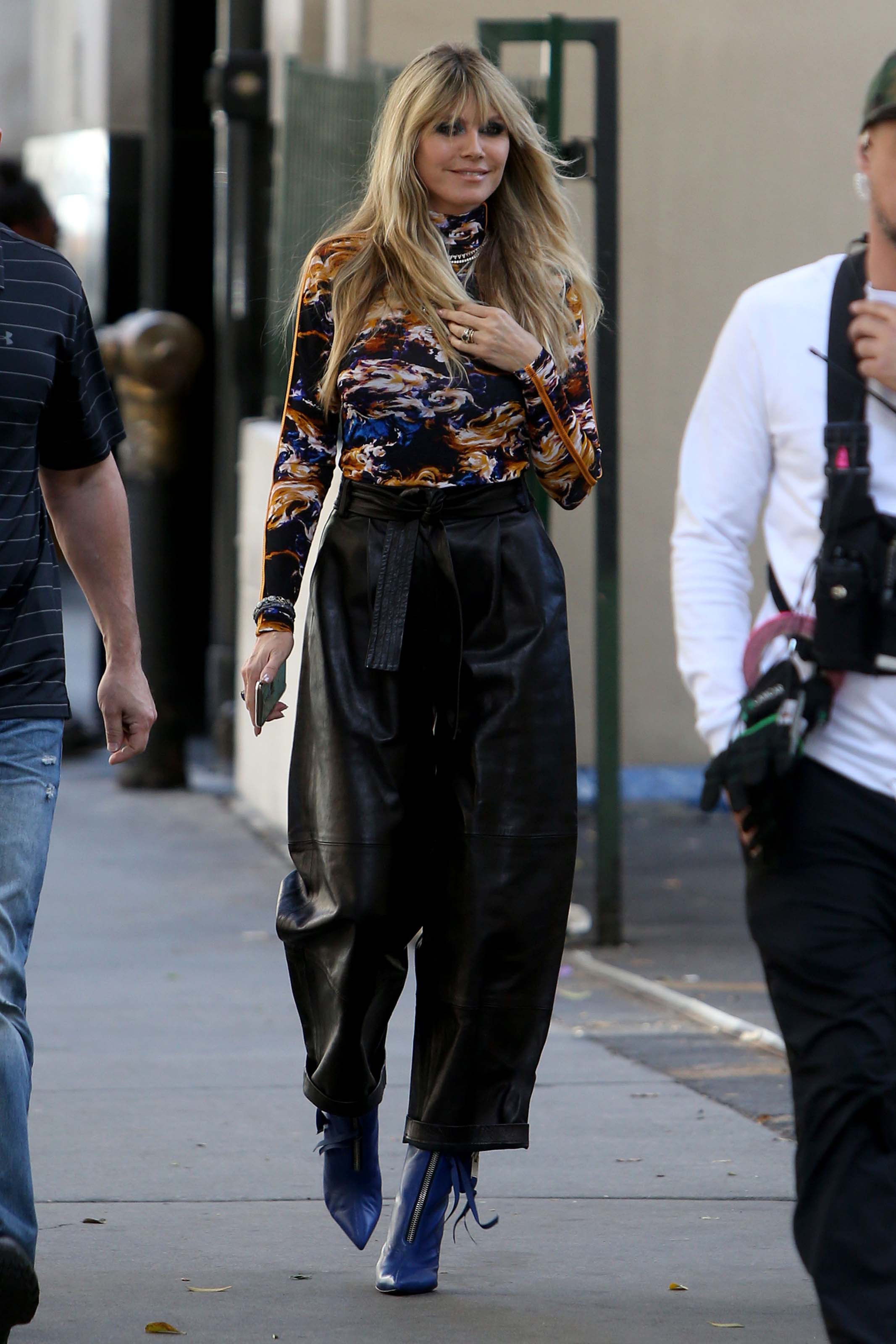 Heidi Klum walking to the Germany’s Next Topmodel set