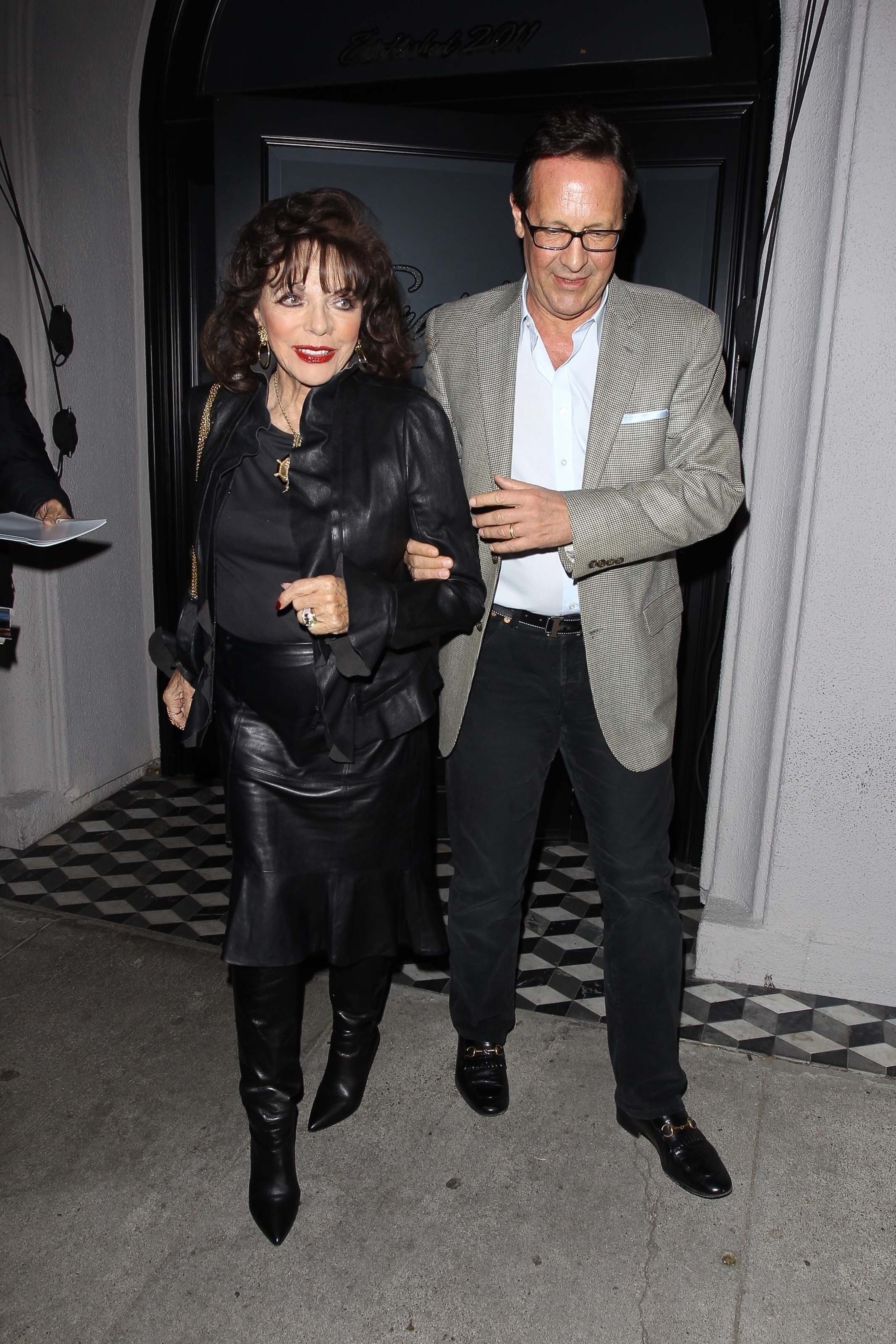 Joan Collins and Percy Gibson enjoy a dinner date
