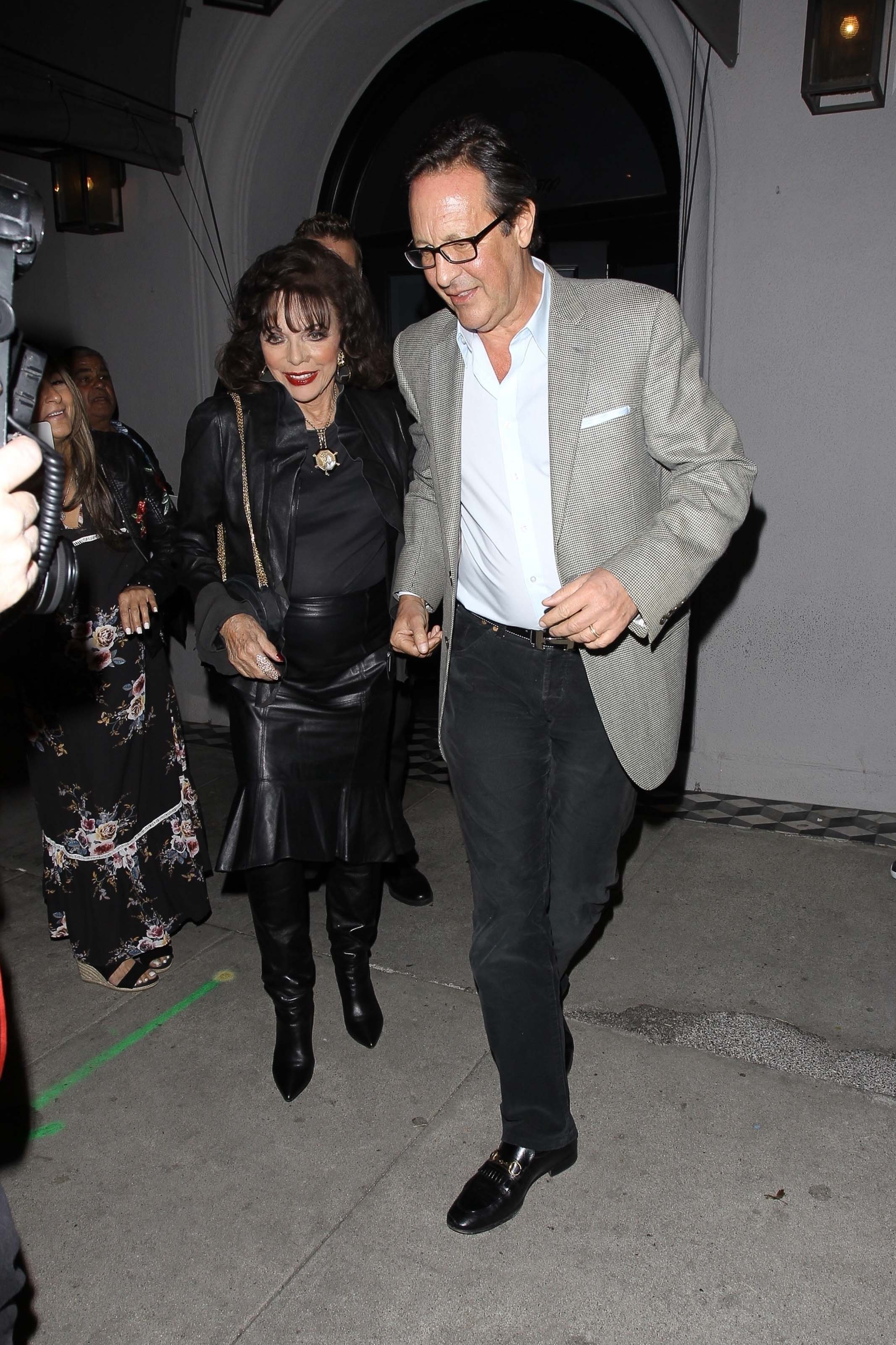 Joan Collins and Percy Gibson enjoy a dinner date