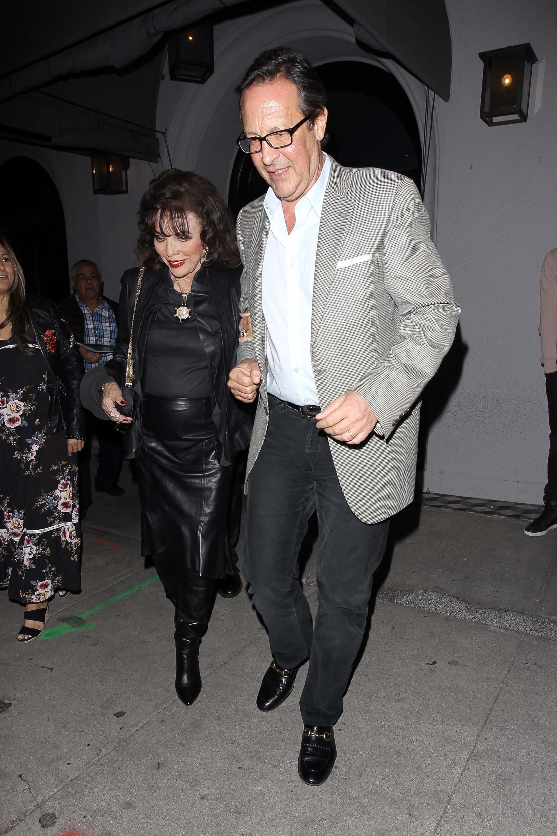 Joan Collins and Percy Gibson enjoy a dinner date