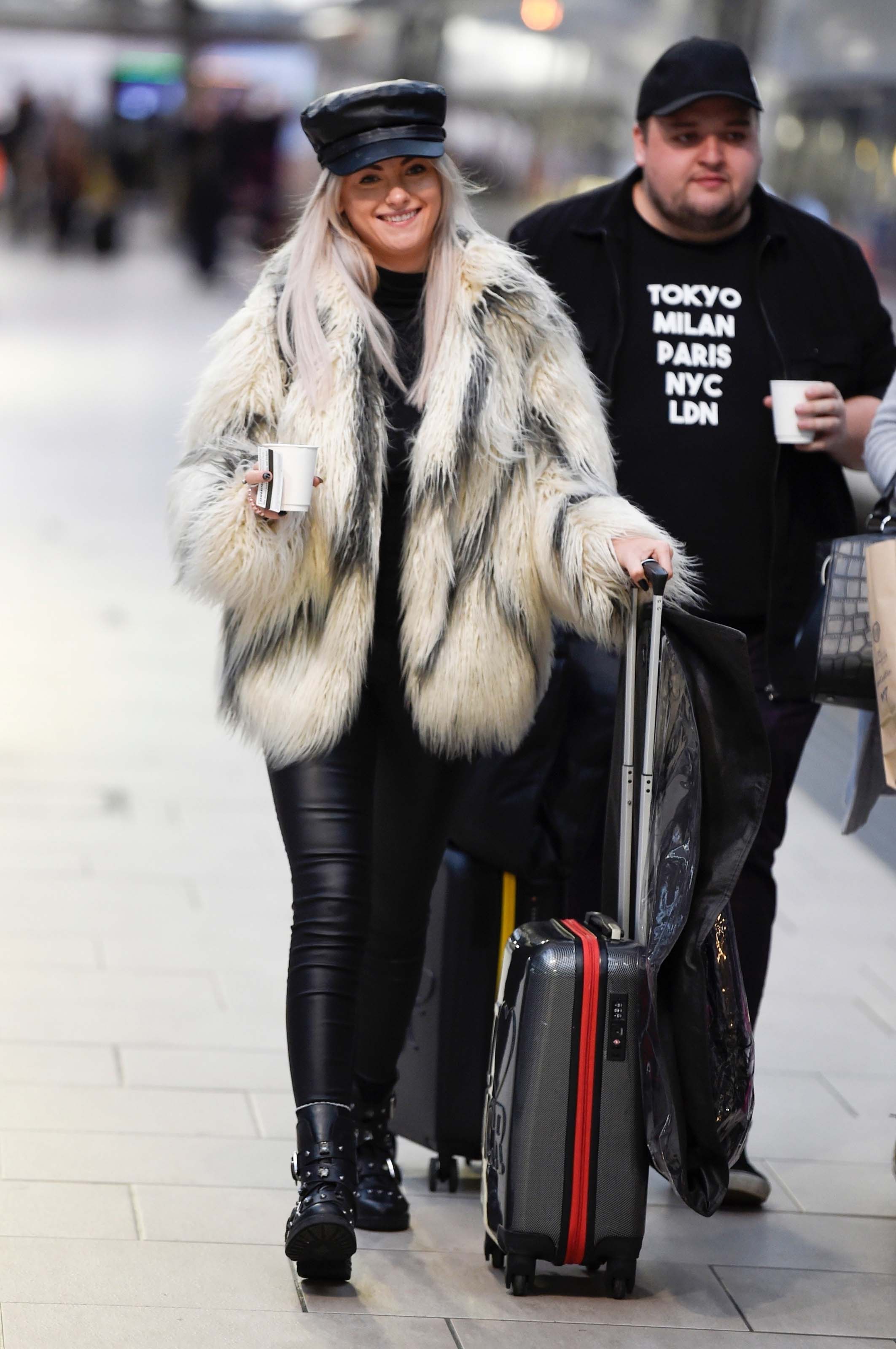 Katie McGlynn see catching an early morning train