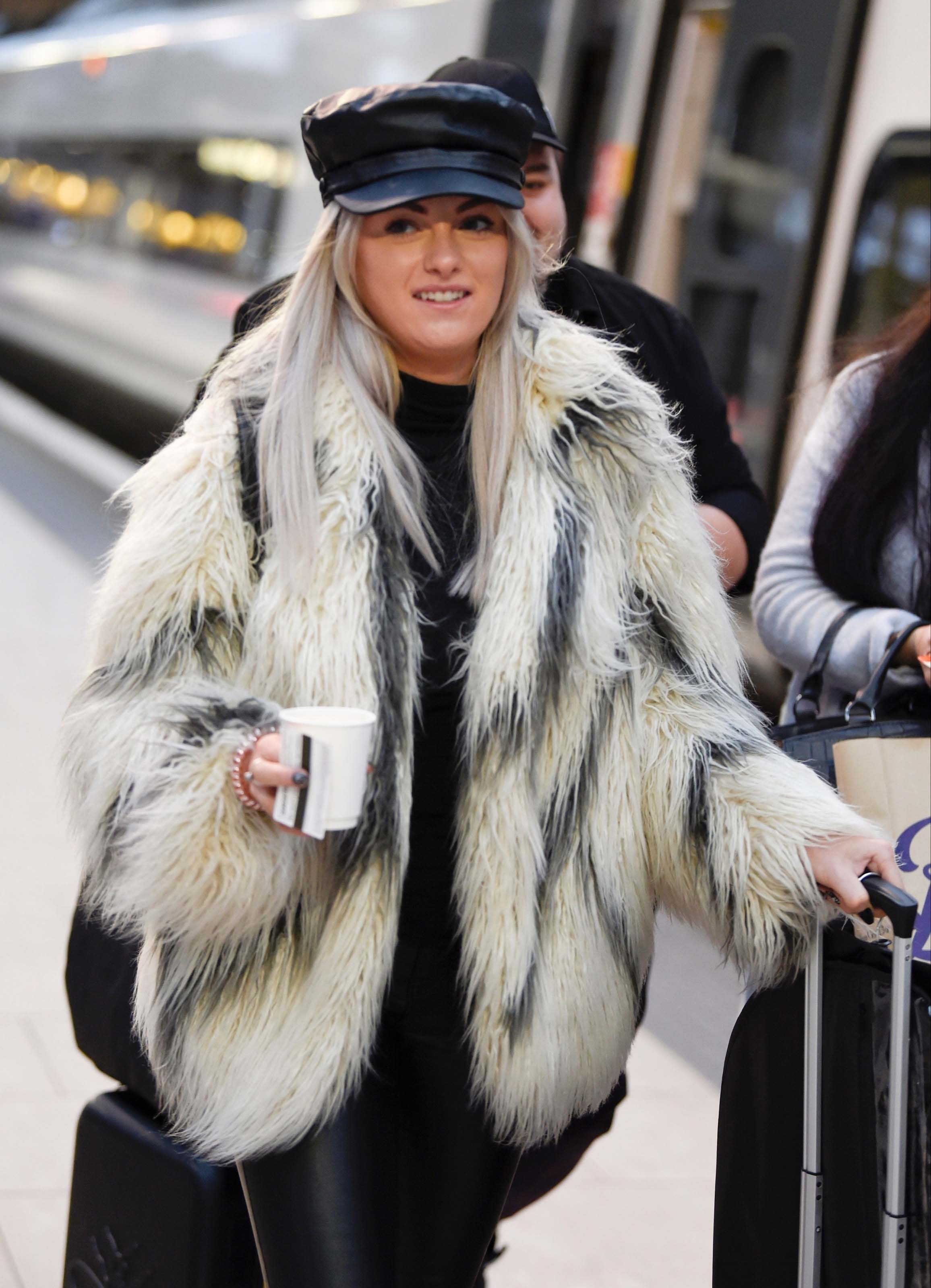 Katie McGlynn see catching an early morning train