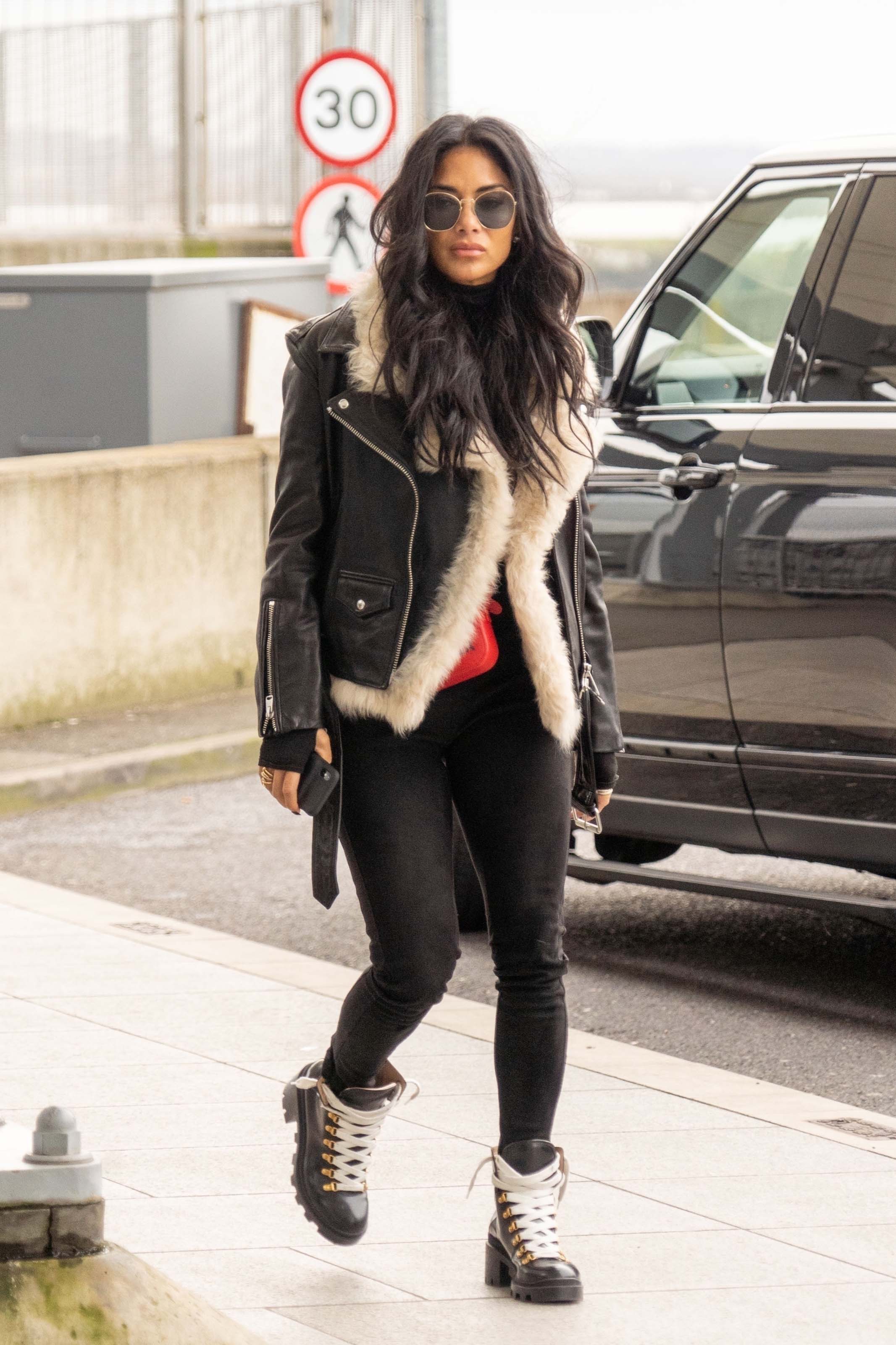 Nicole Scherzinger at Heathrow Airport