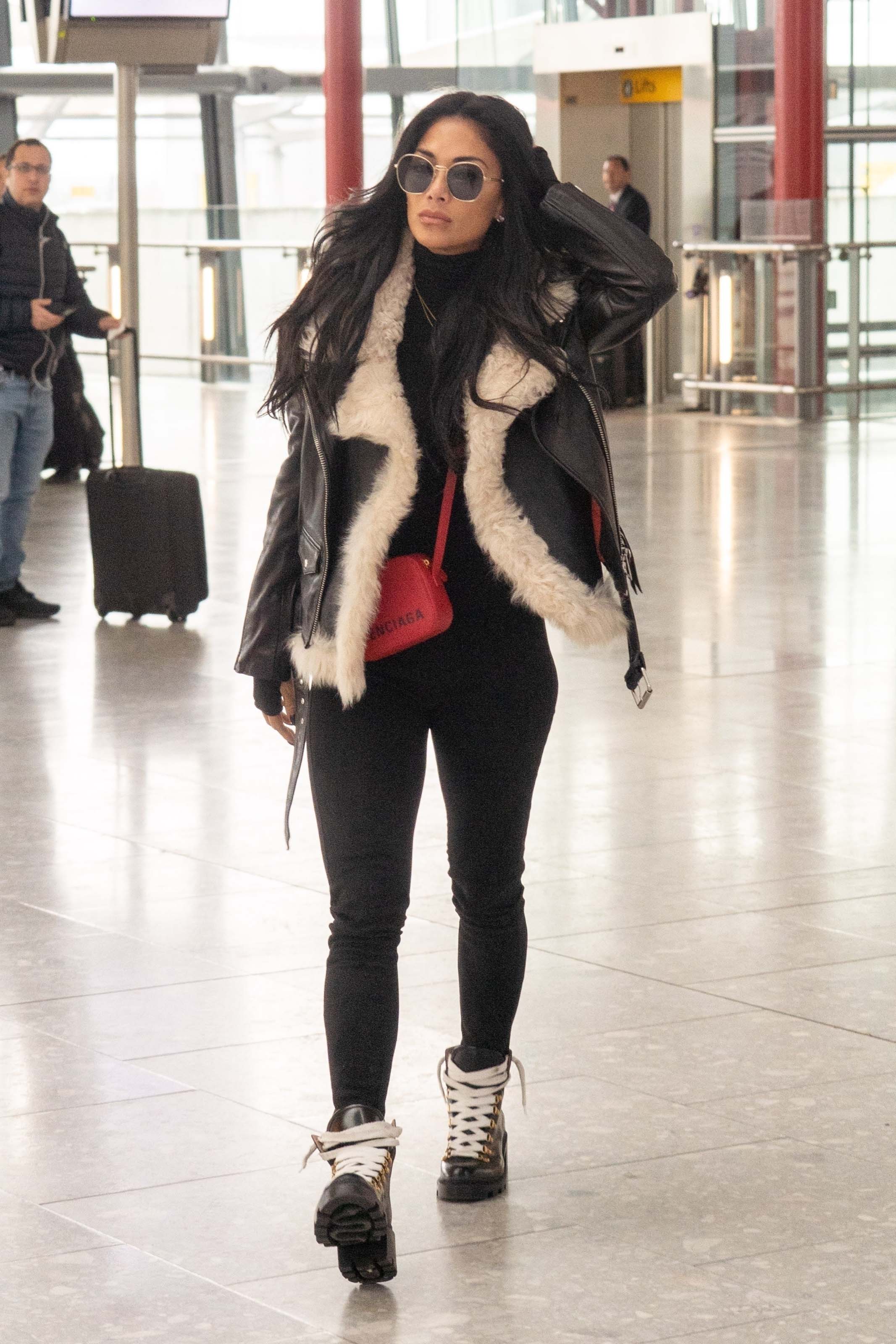 Nicole Scherzinger at Heathrow Airport