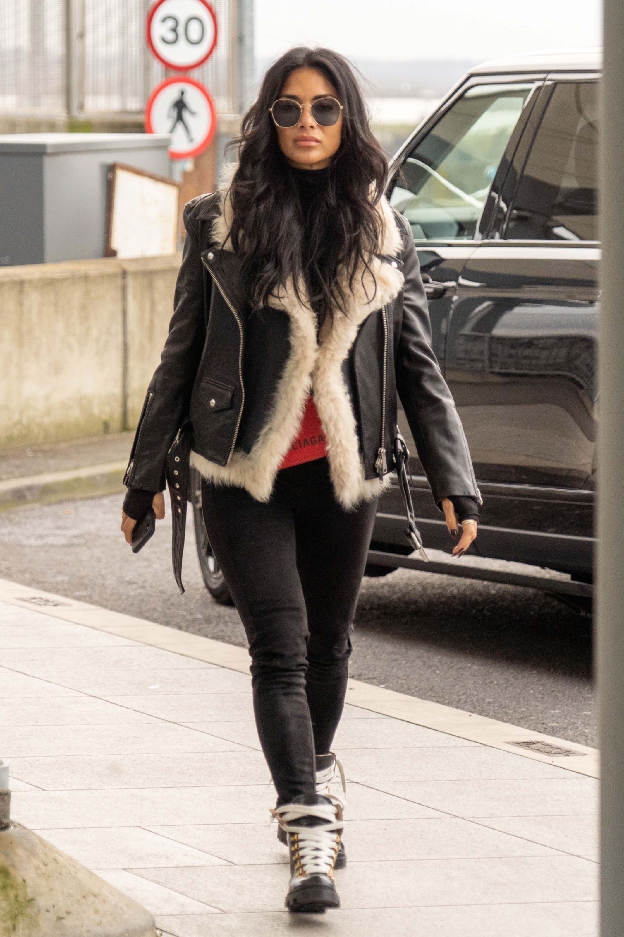 Nicole Scherzinger at Heathrow Airport